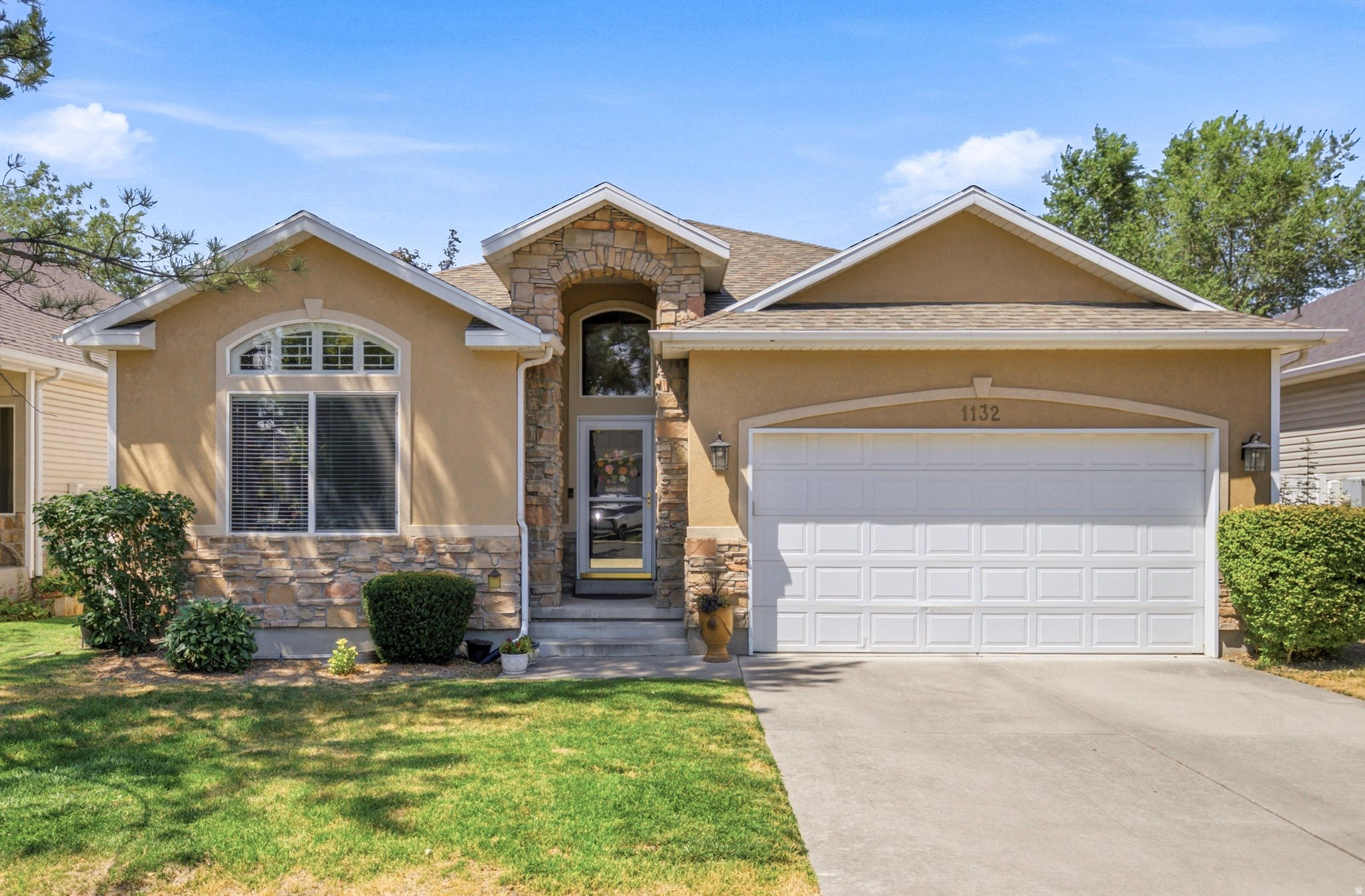 Single-level living in the gated Autumn Lane community. Vaulted ceilings run throughout the main level, giving the home an open, airy feel from the moment you step in. The spacious primary suite includes an en-suite bathroom and a large walk-in closet. The open floor plan connects living, dining, and kitchen, leading directly out to a fully fenced backyard with a patio. This is the perfect setting for BBQs and quiet dinners after enjoying the beautiful Utah outdoors. The exterior also boasts a NEW ROOF. The unfinished basement adds storage now and room to expand later - extra bedrooms, a home gym, additional living space, whenever you're ready. Steps from Fore Lakes Golf Course, this home puts you under 15 minutes from downtown Salt Lake City and the international airport, with the Wasatch mountains less than an hour away. Autumn Lane is a gated community built for people who don't want to choose between city access and mountain access.