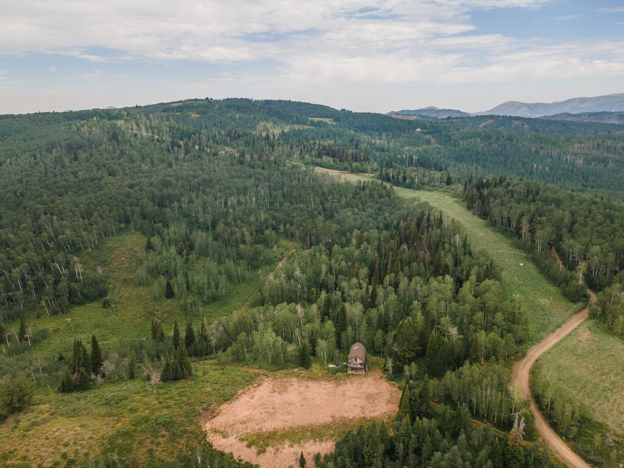 Escape to your own mountain sanctuary with this exceptional 80-acre offering in Scare Canyon Ranch Association. Comprising two 40-acre parcels, this unique property blends a ready-to-enjoy cabin with expansive development potential and breathtaking canyon views. Key highlights - Two 40-acre parcels included: 16-075-0031 and 16-075-0037, together forming a versatile 80-acre canvas for living, recreation, and future cabins. - Parcel 16-075-0031 features a comfortable 1,200 sq ft cabin with a welcoming deck and porch, plus abundant parking for your toys and adventuring gear. You'll enjoy a refreshing shower in the nicely appointed bathroom, and a kitchen/dining/living area designed for entertaining and gathering with friends. Solar power and propane keep this mountain retreat off the grid while still offering modern conveniences.  Marvelous Wood stove for winter times - Parcel 16-075-0037 offers a dramatic, open area carved into the mountain-plenty of parking and spectacular, unobstructed views. This space presents a premier opportunity to build a second cabin or a larger getaway, with the dramatic mountain terrain as your backdrop. - The parcels also include a network of cut-in roads, inviting exploration and easy access to various vantage points across the property. A picturesque meadow with a private campsite and a natural draw provide excellent opportunities for wildlife "viewing" right from your doorstep. - Location and access: tucked off Scare Canyon Rd, just past the second right on Pinion. It's a convenient 30-minute drive from the Scare Canyon Gate off Ant Flat Road, combining seclusion with reachable accessibility. - Outdoor potential: miles of dirt roads and mountain scenery invite hiking, ATV / Snowmobile explorations, and nature watching. The meadow and natural draw are perfect for observing wildlife or simply enjoying the tranquility of high-country living/hunting  This is a rare offering-the best of both worlds: a ready-to-live cabin with the flexibility of an expansive second parcel for future development. Whether you're seeking an intimate mountain retreat or a larger estate with room to grow, this Scare Canyon Ranch property delivers. Cabin is super clean & neat as a pin. Sold Fully furnished and ready for your personal touch. 48 Hour notice to show.  Listing agents must be present to show and tour.  Terms:  Cash or Seller Financing