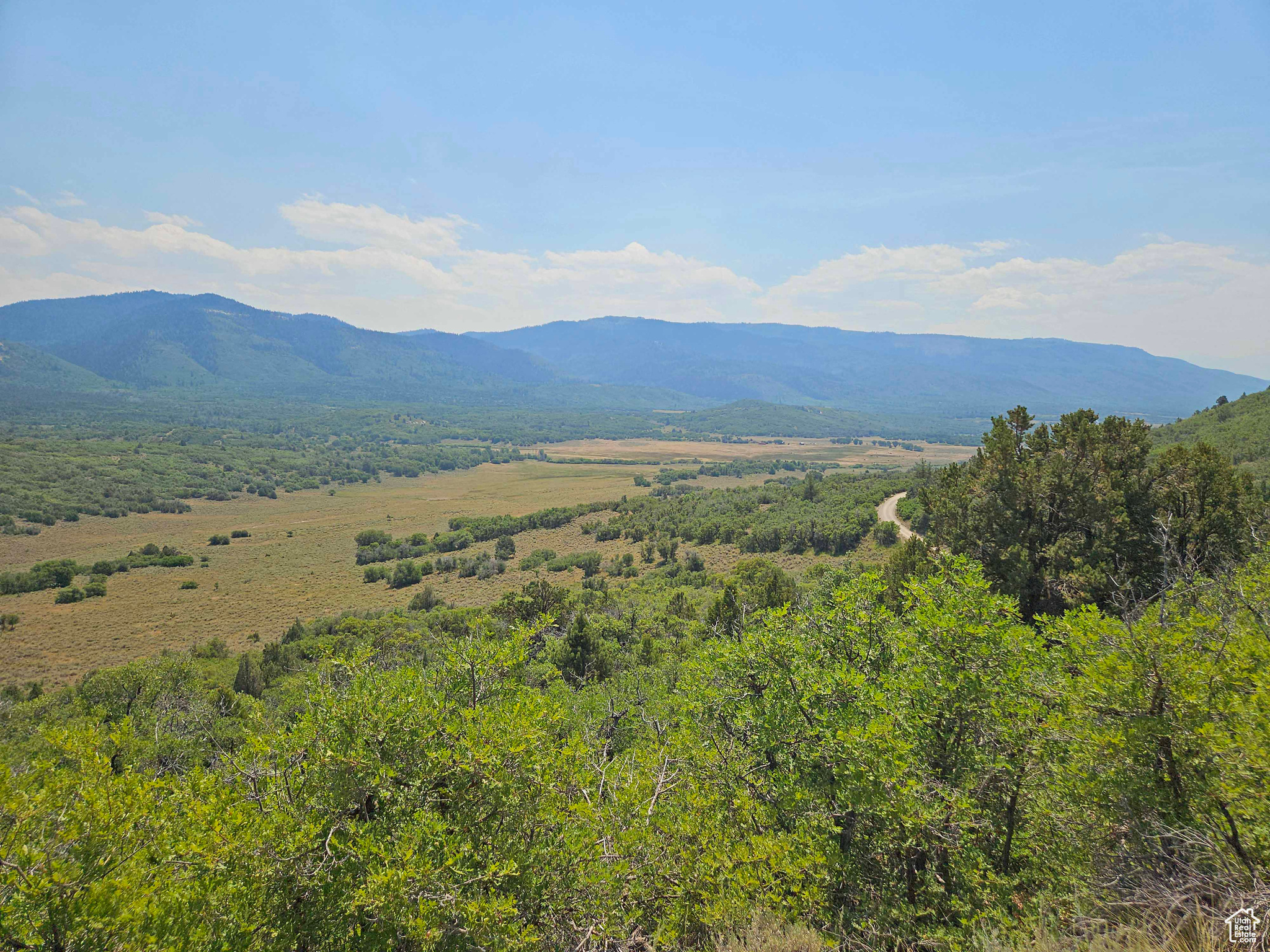 Property defined as being in Hideaway Valley Subdivision, Lot 420. It is located on a ridge and has very nice views of the valley below. Property has pinyon pine, cedar and oak trees. The pinyon pine trees produce a lot of nuts if you get to them before the squirrels. This property has access via 2 roads - one on the East side and one on the West side. Great area for a cabin or campsite. On the West side, there is a old road and excavated camp site, but it is now going back to nature. Property is located 10 to 15 minutes from highway 89. The higher roads to the property are not plowed in the winter.