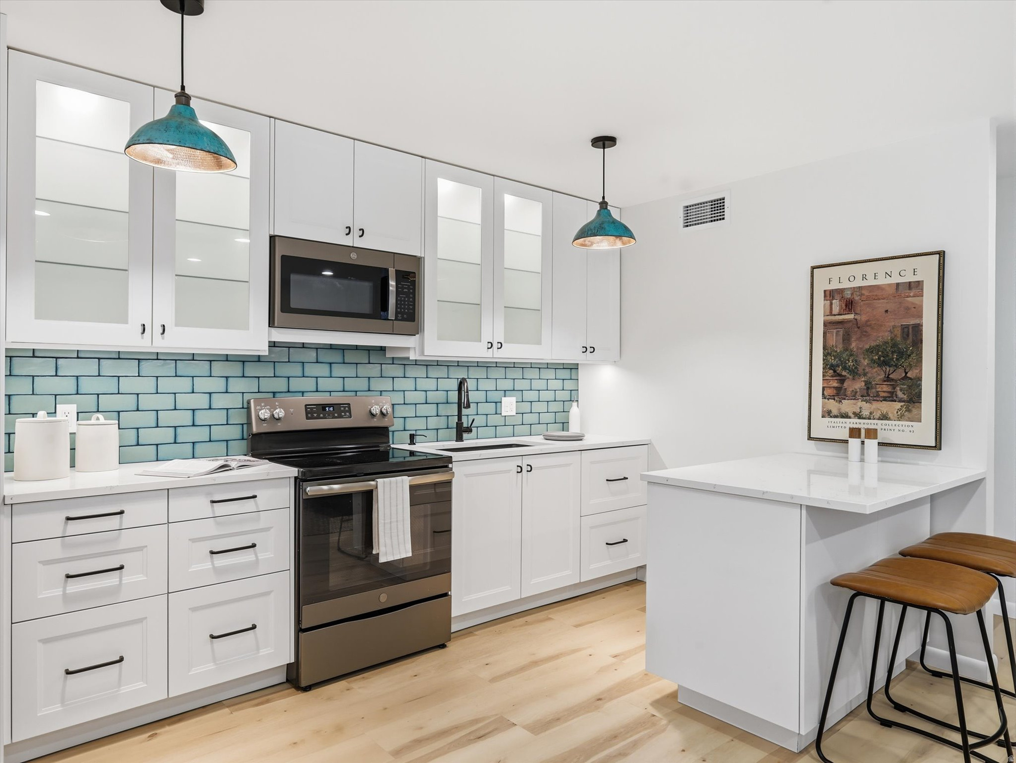 Every inch of this beautifully renovated Avenues condo has been thoughtfully updated and it shows. From the stunning tile backsplash and backlit cabinetry to the stylish laminate flooring, the finishes feel fresh, elevated, and effortlessly livable.  Enjoy the ease of secured parking, the convenience of in-unit laundry, and additional private storage - all while living in one of Salt Lake's most beloved neighborhoods. The community picnic area offers the perfect spot to relax and gather outdoors among the charm of the tree-lined Avenues.  With quick access to downtown Salt Lake and close proximity to the University of Utah, this location offers the perfect balance of character and convenience. Whether you're creating your own city haven or exploring rental opportunities, this one is a must-see. Long-term rentals and short-term rentals of 30+ days are allowed.  Square footage figures are provided as a courtesy estimate only and were obtained from county records .  Buyer is advised to obtain an independent measurement.
