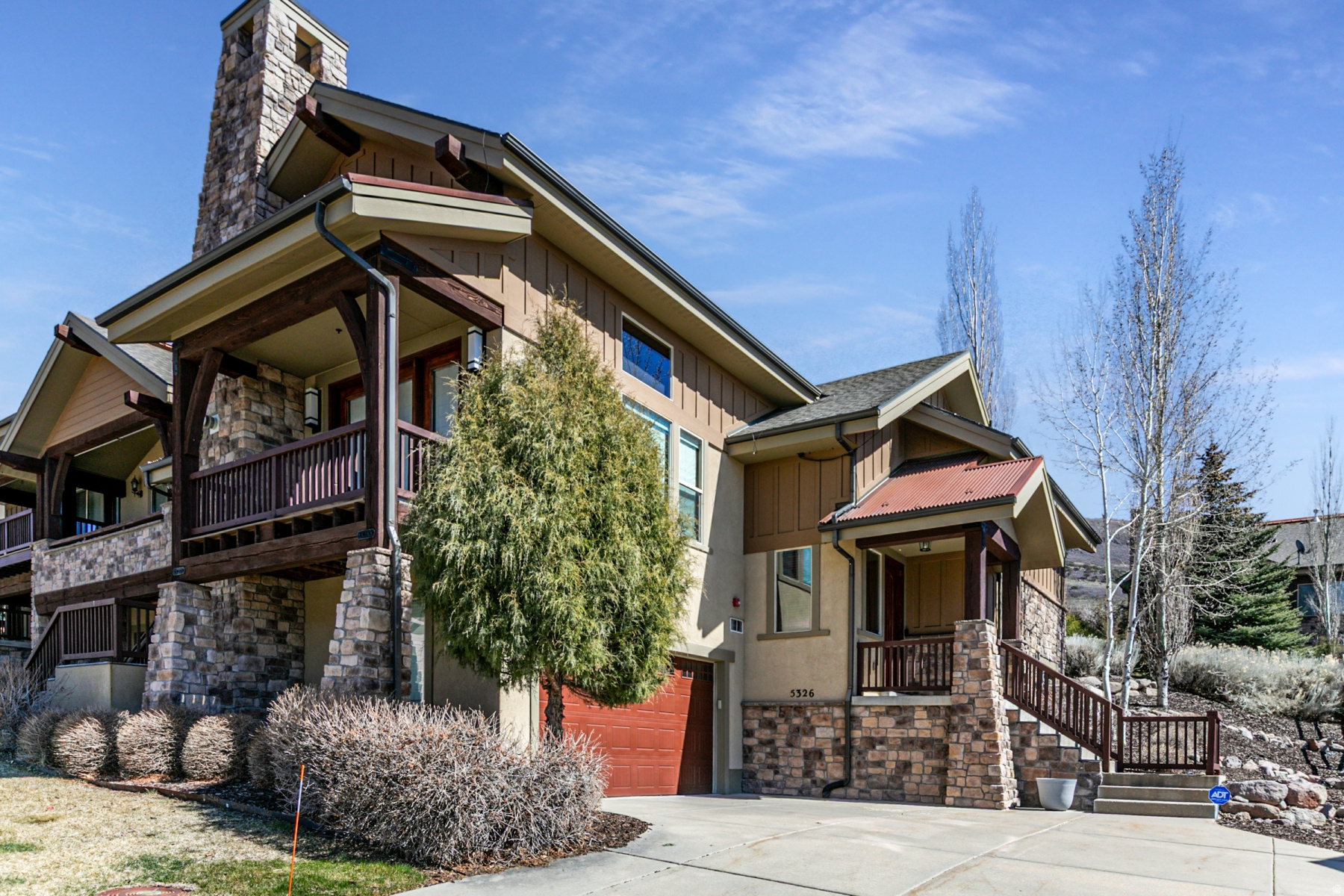 5326 N Oldgate Rd FEATURES Stunning views of the Heber valley and Mt. Timpanogos from your spacious deck off the living room.  This 3 bdrm/3bth, 2176 SF floor plan boasts lofty vaulted ceilings, gleaming hardwood floors, a floor to ceiling stone fireplace and huge windows. Enjoy preparing meals in the gourmet kitchen with knotty alder cabinets, granite countertops, stainless appliances, double oven, gas range, ample cabinet space, and a freestanding island. Cozy up by the roaring gas fireplace on cool evenings or during a winter snowfall. The luxurious main floor master suite has a walk-in closet plus a spa-like bathroom with a double vanity, tile flooring, and a huge shower. The lower level boasts an inviting family room with a fireplace, two additional bedrooms and another bathroom. Park in the two-car garage plus there is plenty of extra space for guests to park in the driveway as needed. This amazing location is just minutes away from the Provo river and world class fly fishing, several amazing golf courses and minutes from ski resorts. Take a short walk to the Coyote trail for great hiking or biking right in your neighborhood.  Beautiful established neighborhood with community center and outdoor pool.  Price excludes furnishings; however, furnishings can be purchased separately. Buyer or Buyer's agent responsible to verify the accuracy of all information. This information is subject to change without notice. Brokerage assumes no responsibility for accuracy.