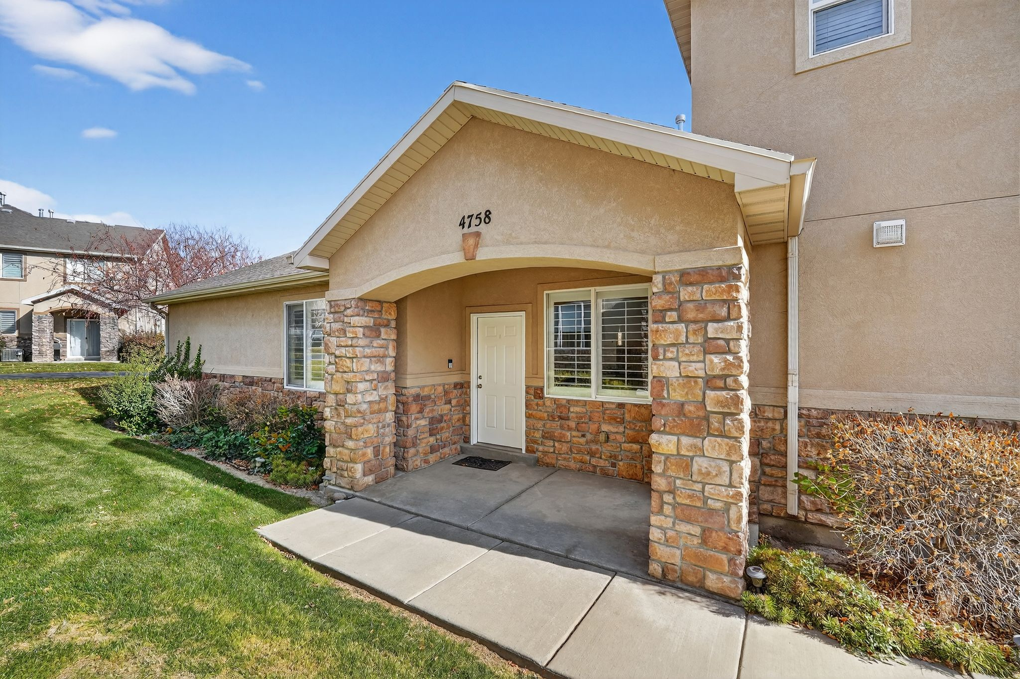 Don't miss this rare single-level townhome in one of Herriman's most peaceful and desirable communities! This beautifully maintained home offers comfortable, stair-free living with 2 spacious bedrooms, 1 full bathroom, and a bright open-concept layout designed for easy everyday living. The kitchen has been tastefully updated with brand-new quartz countertops, a new dishwasher, and ample cabinet space. You'll also love the dedicated laundry room, abundant natural light, and clean, move-in ready condition. Conveniently located just minutes from Mountain View Village with shopping, dining, entertainment, and exciting new additions coming soon, including Target and Trader Joe's! Close to parks, schools, and walking trails, this home combines comfort, convenience, and an unbeatable location.