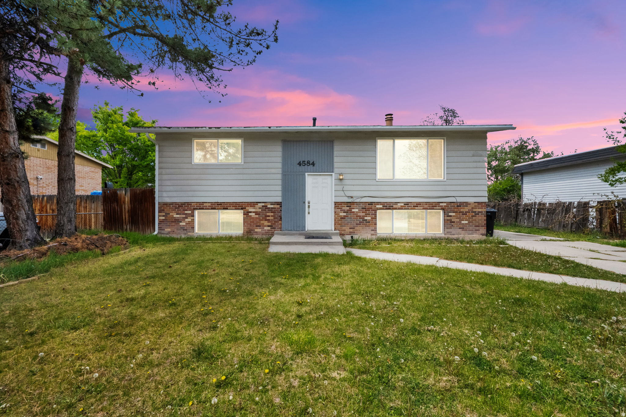 THE SELLER IS OFFERING A $2,000 ALLOWANCE FOR CARPET AND/OR PAINT. Welcome home to this versatile 5-bed, 2-bath property in the heart of desirable Taylorsville! Featuring a mother-in-law/basement apartment, it's perfect for multigenerational living or generating rental income. Enjoy bright, comfortable living spaces, a private lower-level setup, and plenty of parking for family and guests. Ideally located just minutes from shopping, dining, and everyday conveniences. This home offers both comfort and opportunity in a location you'll love! Square footage figures are provided as a courtesy, buyer is encouraged to take their own measurements.