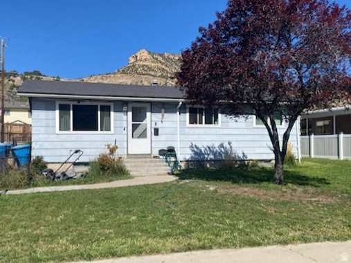 Great buy in the heart of Helper.  Motivated Seller- Seller is willing to pay $2500 in buyers closing costs.  Home being sold AS IS.  Extra large lot with great potential.     Possible 5 bedroom home that is waiting for a new owner.  Bathroom in basement needs to be finished.  Terms of sale is Cash, conventional rehab or FHA 203 (k) loan.   24 hours notice is required.  Square footage figures are provided as a courtesy estimate only and were obtained from court house.  Buyer is advised to obtain an independent measurement.