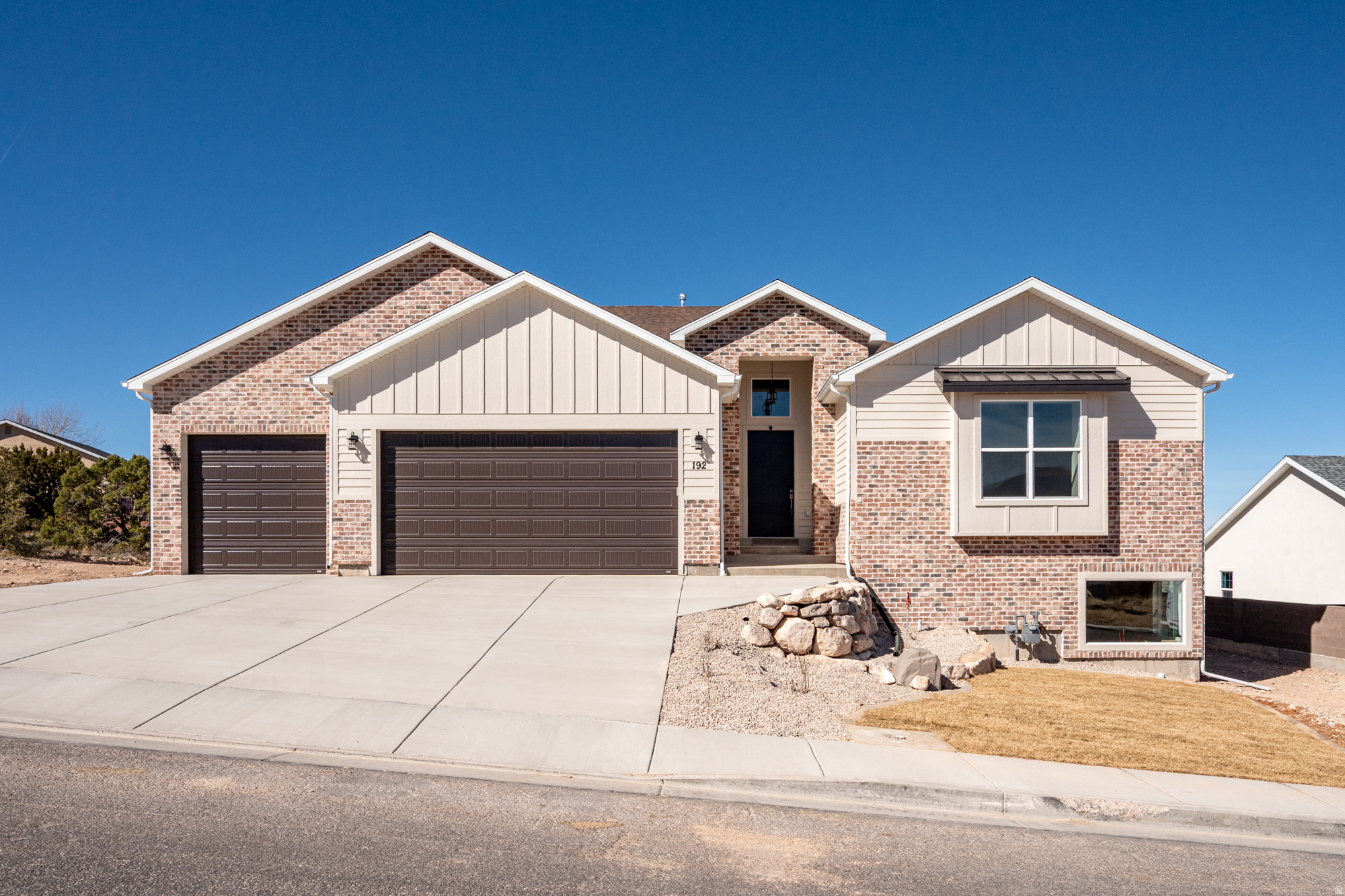 Amazing views and exceptional value. New construction with open living, fireplace, 13' ceilings, and large windows. Four bedrooms on the main level, most with private baths. Primary suite with spa shower and walk-in closet. Walk-out basement framed and ready to finish. Nightly rentals allowed.