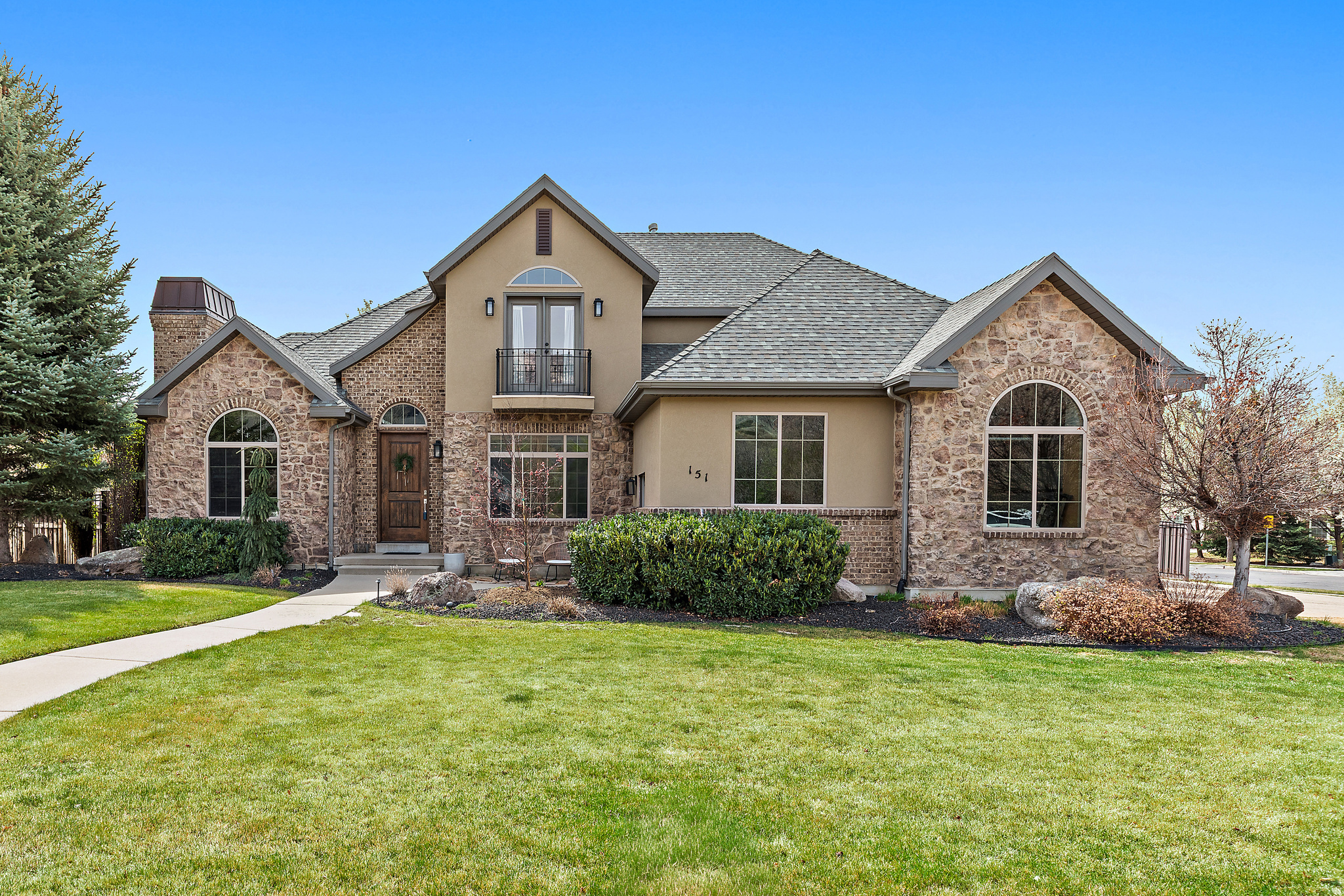 GREAT LOCATION* Highly sought after Deerfield area of Alpine's Whitby Woodlands neighborhood, this home offers a great combination of comfort, space, and location. CONVENIENT ACCESS to parks, schools, and downtown Alpine, with open space right across the street that adds a sense of privacy, room to breathe and great Mountian views. MAIN FLOOR LIVING with a large master suite. Large deck creates the perfect spot for gatherings or quiet evenings, and the fully fenced backyard helps to offer privacy.  THREE CAR GARAGE with plenty of storage space and RV PARKING.  Fully finished basement with storage space and a walk-out entrance making for the possible option of a future apartment set up.  QUIET NEIGHBORHOOD and very low turnover as people enjoy living and staying in the area. Plus, there is room for more bedrooms as the original floor plan layout has space for up to 6-7 bedrooms. EASY TO SHOW.