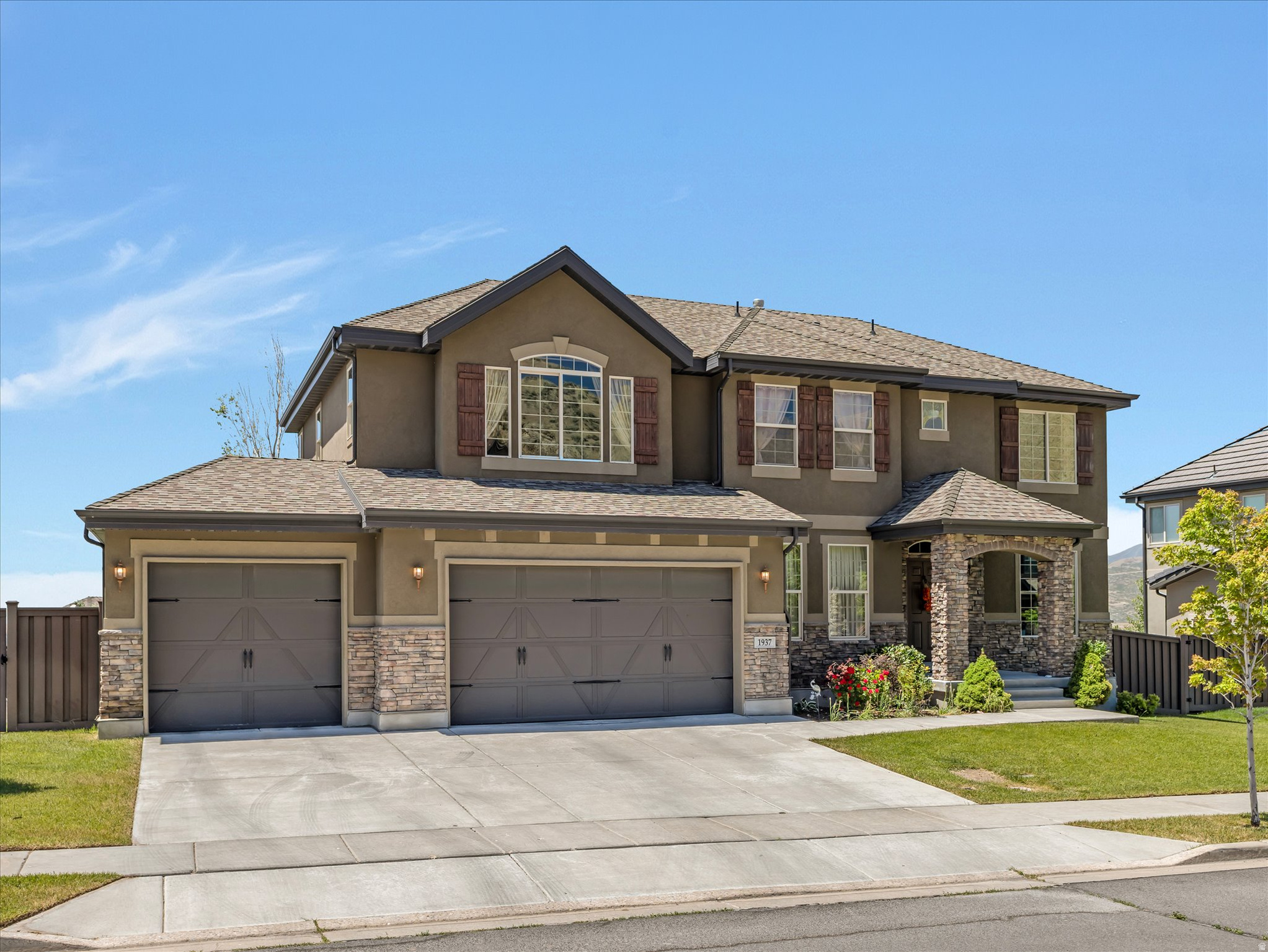 Beautifully Spacious Two-Story Home in Lehi! Welcome to this Exquisite Two Story Home located in Woodhaven development of Traverse Mountain.  Featuring a unique catwalk concept, this home offers 4 bedrooms and 2 bathrooms, combining generous living space with comfort and functionality. Perfect for both everyday living and entertaining! Step inside to discover an open and inviting floor plan filled with beautiful natural light and highlighted by large picture windows that create a bright, welcoming atmosphere. The home is enhanced with LVP flooring throughout, complemented by travertine tile and a stylish custom backsplash in the kitchen, adding both elegance and durability. The kitchen offers plenty of space for cooking and gathering, seamlessly connecting to the main living areas for effortless flow. The thoughtfully designed layout includes well-sized bedrooms upstairs, with the catwalk feature adding architectural charm and an open, lofty & airy feel to the upstairs hall. The large picture windows from the living room filter in beautiful light onto the catwalk, connecting the two areas creating the heart of the home. The expansive square footage continues into a walk-out basement, offering incredible creative potential to design your ideal space for a home theater, gym, separate living quarters, or entertainment retreat. Outside, enjoy the charm of Lehi living with nearby parks, schools, and convenient access to retail shopping and a variety of popular dining establishments. Just minutes away, American Fork Canyon invites you to explore year-round outdoor recreation from fishing and kayaking to camping and scenic drives along the breathtaking Alpine Loop. Don't miss the opportunity to make this beautiful property your own the perfect blend of style, space, convenience, and outdoor adventure!