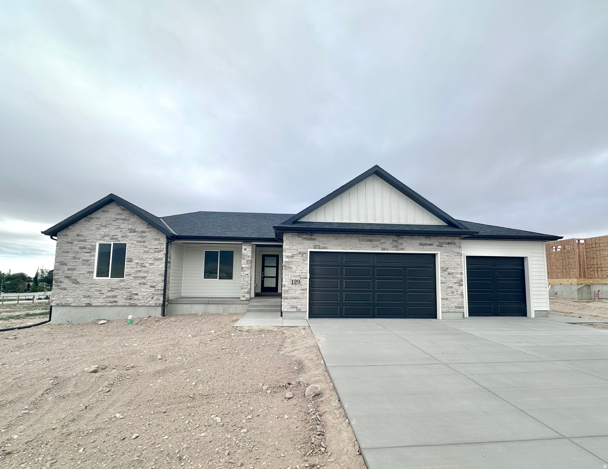 THIS HOMES IS NOT BUILT YET, SO THERE IS STILL TIME TO CHOOSE YOUR COLORS... ENJOY OUR HOMES WITH AN OPEN FLOOR PLAN, THREE CAR GARAGE, CUSTOM CABINETS, GRANITE COUNTER TOPS AND TILED BATHROOMS. OUR HOMES ARE BUILT TO LAST, WITH TONES OF FLOOR PLANS TO CHOOSE FROM WE HAVE THE RIGHT HOME FOR YOU.  $20,000 IN INCENTIVES WHEN YOU USE OUR PREFERRED LENDER. CALL US TODAY TO SEE OUR MODEL HOME.