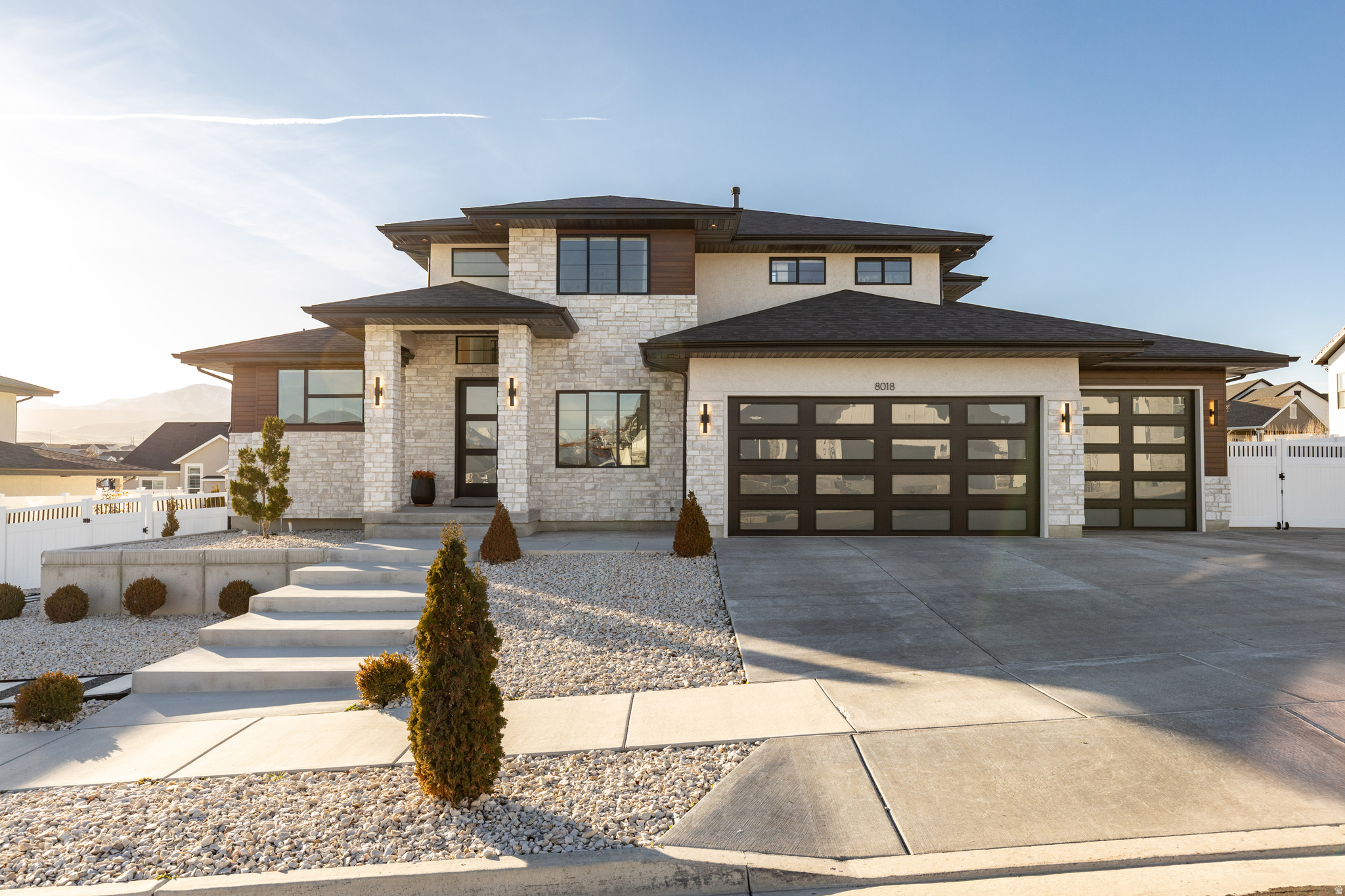 Beautiful semi-custom home with thoughtful upgrades throughout, set in a family-friendly community. High ceilings and expansive windows create an open, airy feel with abundant natural light. Features include decorative ceiling beams, a stunning 6cm quartz waterfall island with matching backsplash, and a 6-burner commercial- style range top. The modern layout flows seamlessly, complemented by a custom master closet and elevated finishes from top to bottom. A rare find combining style, function, and contemporary design.  https://my.matterport.com/show/?m=95yzhQWJfWw