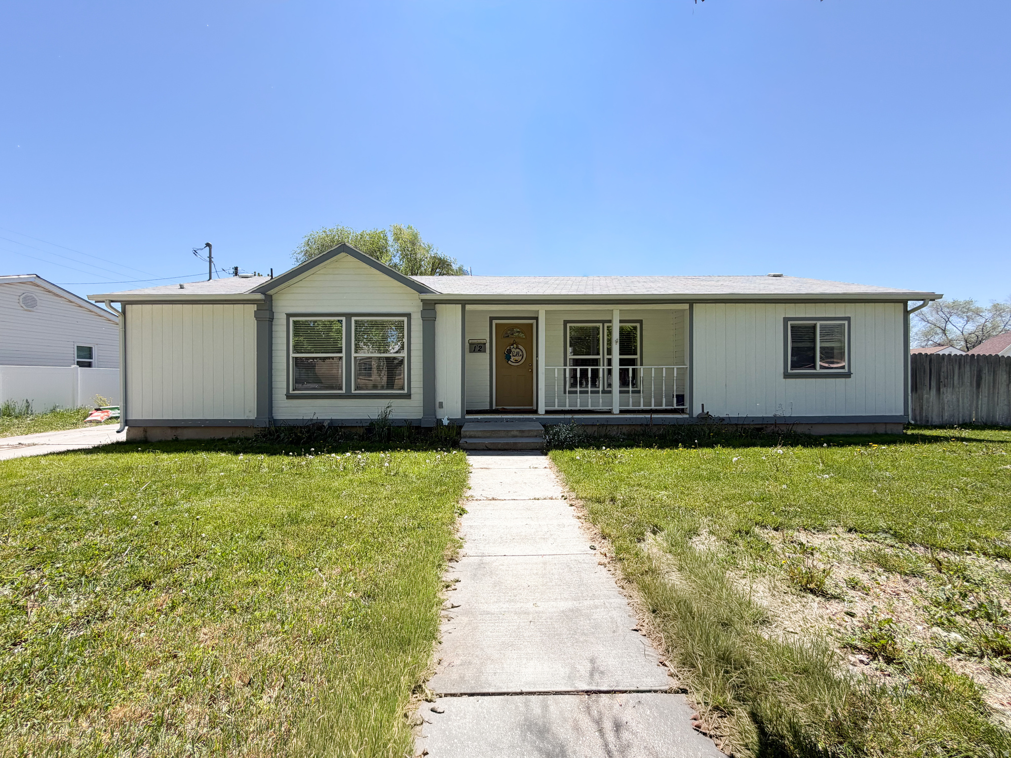 This beautiful home is located in the heart of Tremonton, just blocks from downtown.  Inside this one level home, you will find LVP flooring throughout, and expansive windows that bring in tons of natural light.  There are two spacious sheds outside for storage and a fully fenced in backyard for your privacy.  The home comes equipped with several upgrades that have been done in recent years-including a new range, newer roof, solar panels, as well as a modern water heater and central air system.