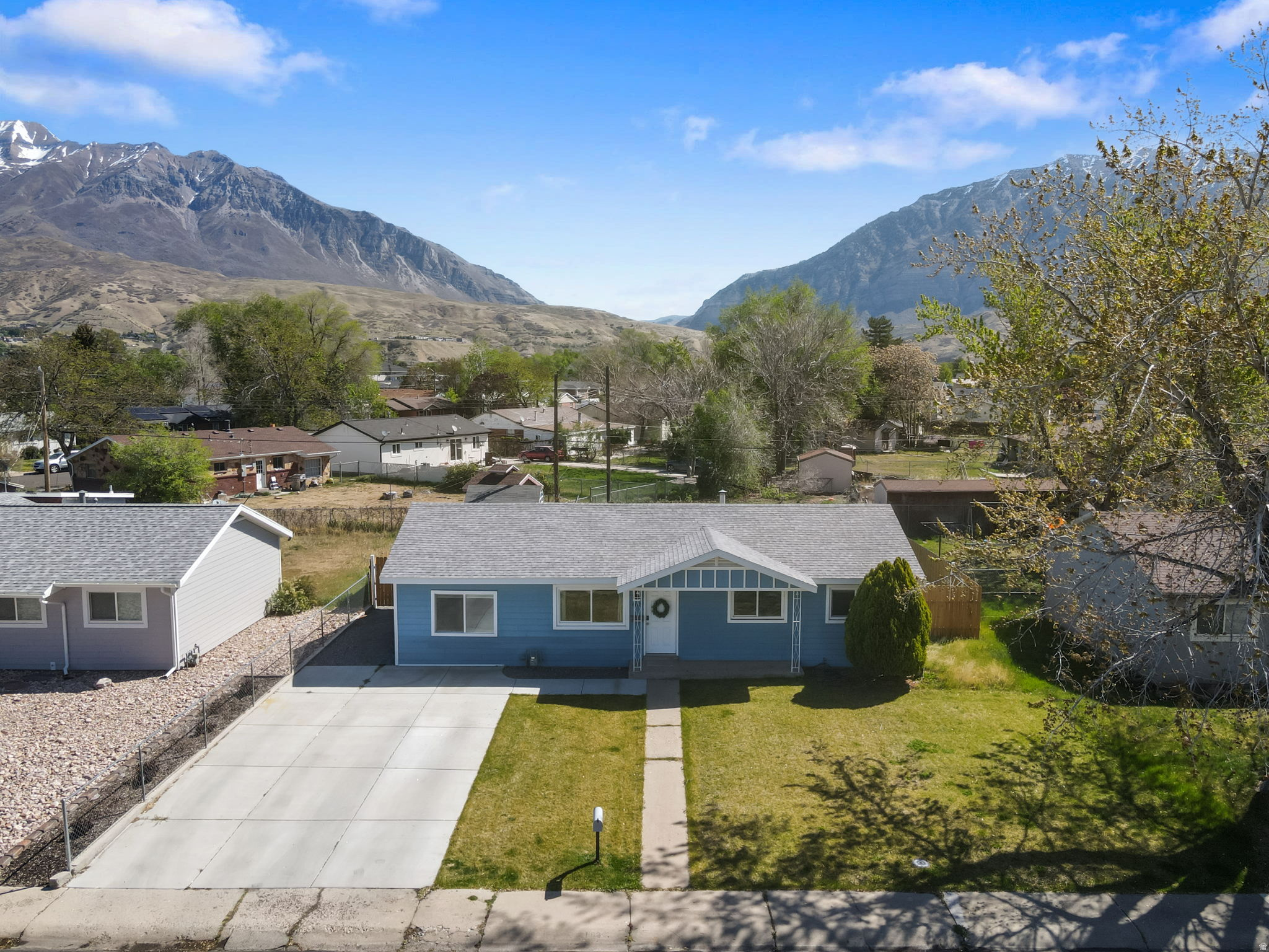 There isn't a better-kept home on the market in Orem than this gem. Nestled in a very quiet, well maintained neighborhood, this property immediately stands out with its exceptional curb appeal and pride of ownership. From the moment you arrive, you'll fall in love. Inside, the home offers two spacious living areas, providing flexibility for both relaxing and entertaining. The updated kitchen features modern touches, while the beautiful paint and carpet throughout create a clean, inviting feel. Step outside and enjoy a thoughtfully designed yard complete with vibrant, flourishing landscaping, a garden area, and a convenient storage shed, perfect for those who appreciate outdoor living and functionality. Location is everything, and this home delivers. Ideally situated near schools, shopping, and dining, you'll also be just minutes from the breathtaking beauty of Provo Canyon, the recreation and charm of Sundance, and the scenic Murdock Canal Trail. This is a rare opportunity to own a meticulously maintained home in one of Orem's most desirable and peaceful neighborhoods.   Square footage figures are provided as a courtesy estimate only and were obtained from country records.  Buyer is advised to obtain an independent measurement.