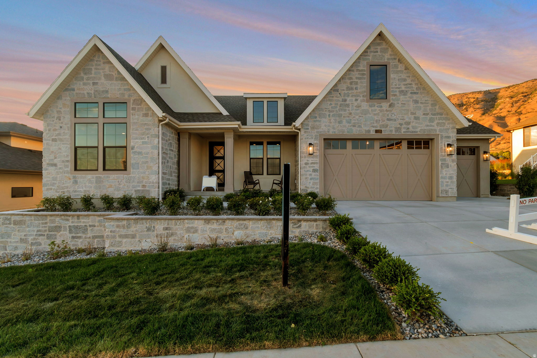 LOT#106. This stunning "Treble XL" nestled on the east bench against Mt. Timpanogos has awesome and timeless curb appeal with Symphony Homes' new "European Romantic" exterior, and tons of upgrades throughout this very popular and spacious floorplan! Quality wide-plank LVP flooring, extra high ceilings and vaulted ceiling in the family room with stain grade beams. Kitchen has upgraded appliances, including 48" dual fuel gas range, built-in column fridge & freezer with panels. Walk-in butler's pantry with countertops and outlets. Huge dining nook surrounded by large windows. Large laundry room includes ample cabinetry & countertop. Primary suite has a recessed tray ceiling w/ crown and features a huge custom walk-in closet, and an elegant bathroom! Second bedroom on main level has a unique feature of a vaulted ceiling and its own en-suite bathroom! You'll love entertaining in the finished basement featuring a beautiful wet bar. Lots of storage space throughout including a dedicated finished storage room with shelving. Garage is finished with epoxy flooring, and the 3rd stall is 40' deep! Large covered patio, and spacious backyard to enjoy the gorgeous views. Amazing craftsmanship and interior design throughout.