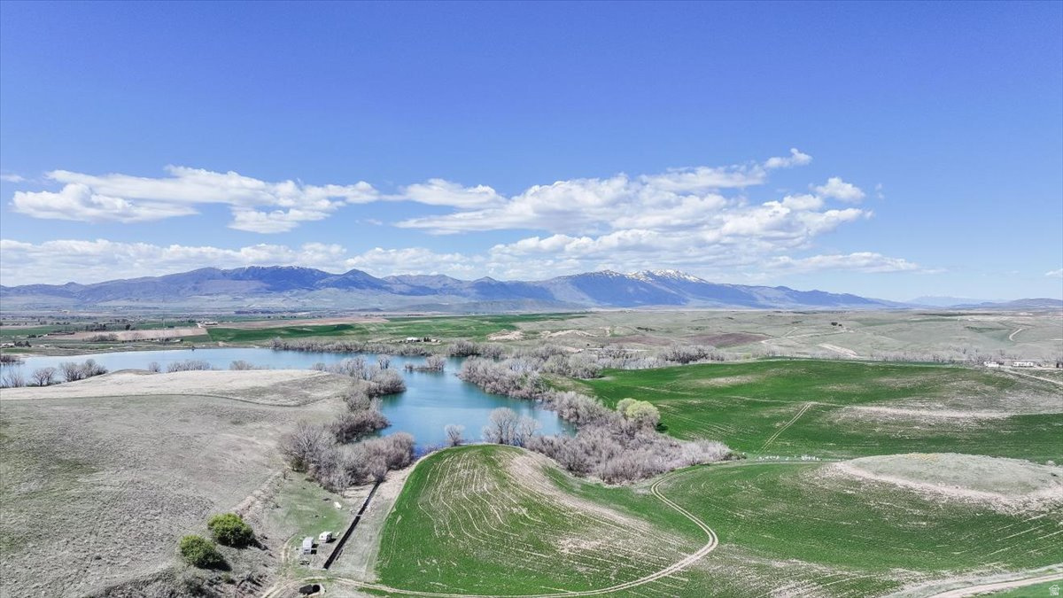 Lake views and plenty of privacy. Acreage is aprox. A survey will need to be done to know for sure. Potential for this land is open for many options. It is currently being farmed. Beautiful mountain valley views with views of Foster reservoir. 5 min to town but peaceful private space. Build a home, have toys and animals. Potential for development. Wild life and fishing. Just down the road from the Preston Golf course