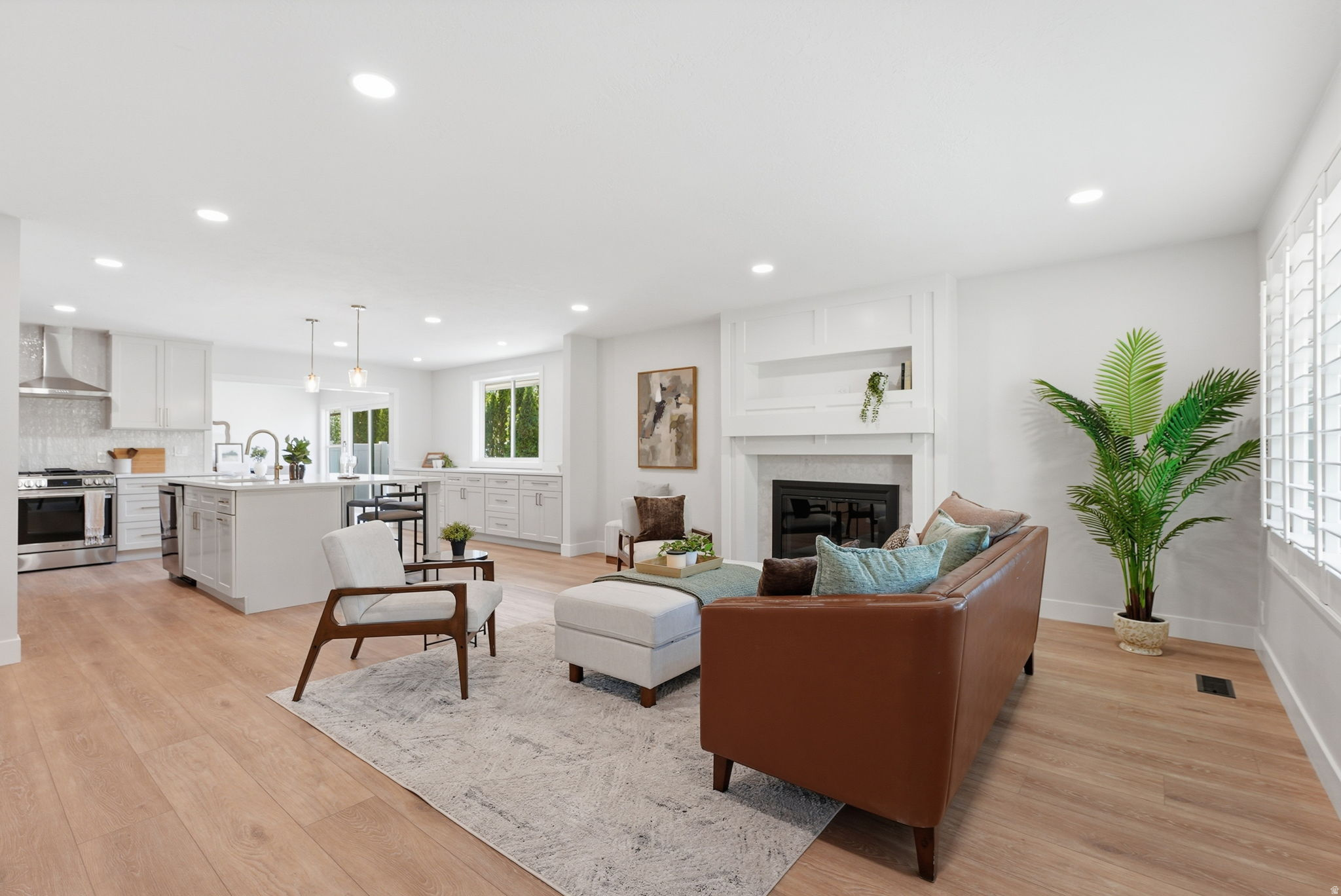 Tucked into one of Holladay's most sought-after pockets, this beautifully updated condo lives like a single-family home without the upkeep. Main-level living and a low-maintenance setup make everyday life effortless. Every inch has been thoughtfully refreshed with new flooring, fresh paint, and fully updated kitchen and bathrooms that give it a move-in-ready feel from day one. Two fireplaces add warmth and character, making the space as comfortable as it is refined. Whether you're hosting or unwinding, the layout supports both with ease. Outside your door, Holladay delivers quiet, established neighborhoods with easy access to the amenities, dining, and recreation that make this area one of the most desirable along the Wasatch Front. The location puts you close to everything while still feeling removed from it all. Square footage figures are provided as a courtesy estimate only. Buyer is advised to obtain an independent measurement.