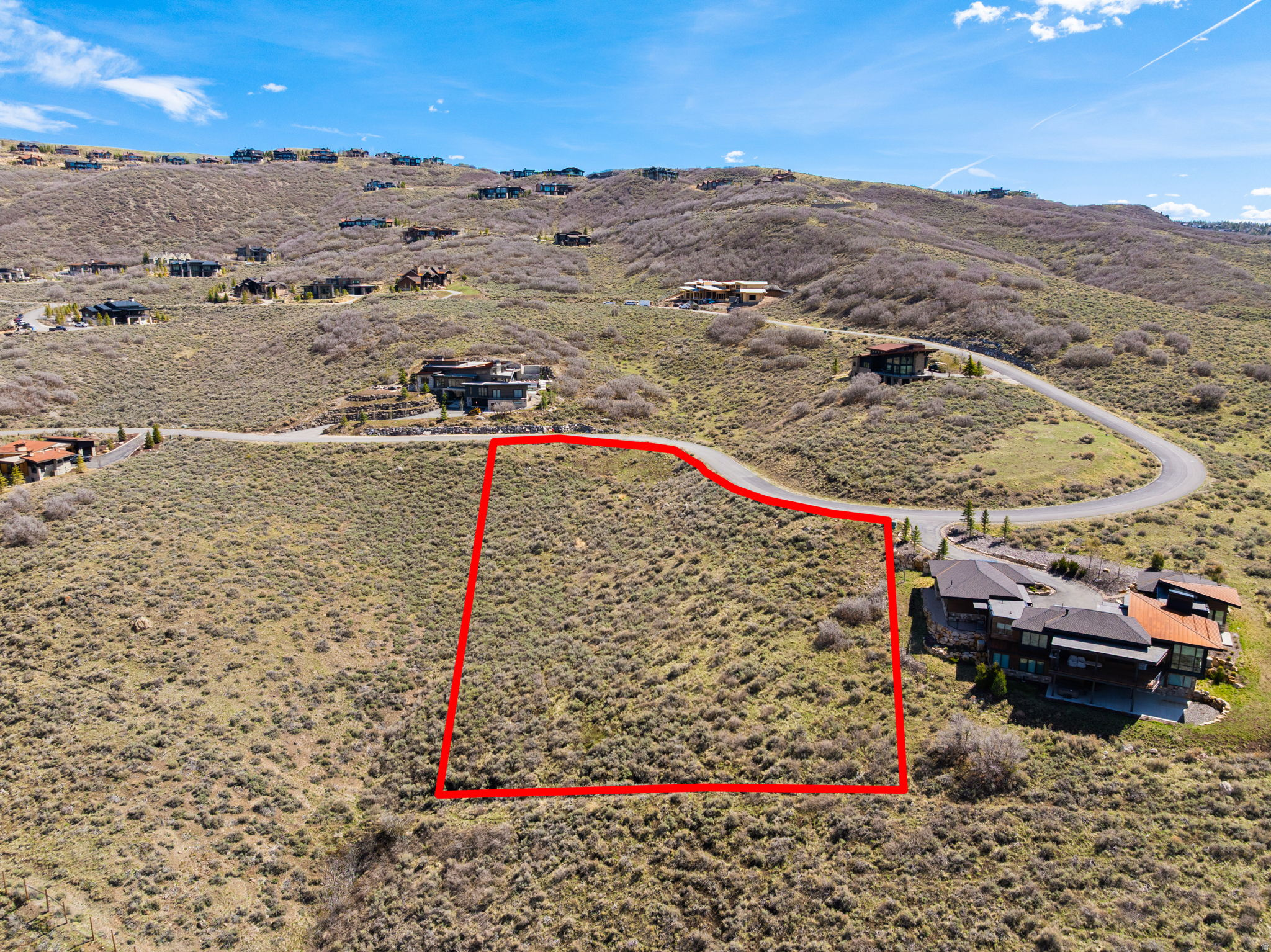 Best priced lot available in Promontory! This 1.22 acre homesite is set in the mountain scenic Northgate Canyon in Promontory. A unique opportunity to design and build your own home in one of the most amenity-rich private gated communities in Utah. The Social Club membership includes access to multiple dining venues and beautifully appointed clubhouses offering something for every lifestyle. Amenities include a full-service spa and fitness center, outdoor pools, 50+ miles of scenic hiking and walking trails, biking, limited golf privileges, basketball courts, a private theater, Beach Club with private lake, tubing hill, fishing, tennis, bowling, ice skating, and equestrian facilities.-creating a true four-season resort experience. In addition, members have the unique benefit of private ski lodges at Park City Mountain Resort and Deer Valley Resort, providing effortless access to world-class skiing and aprs-ski amenities. This is your chance to build a legacy home in a community that blends luxury, recreation, and natural beauty.
