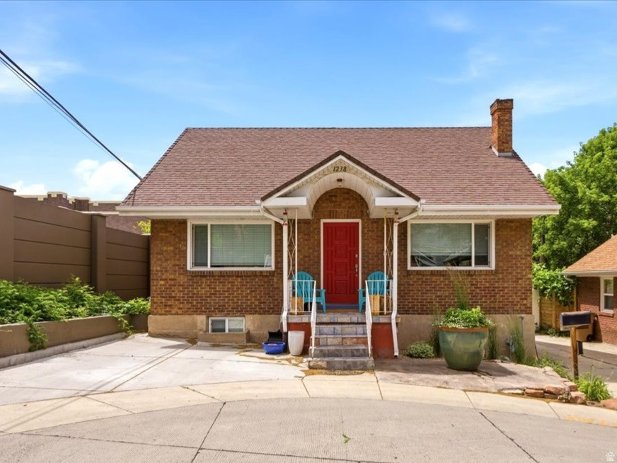 Rare Find! Charming all-brick bungalow in an exceptional location featuring a basement apartment!  And just a short walk to the University of Utah and McGillis School. Relax on your front porch, and enjoy the peaceful setting of this quiet, dead-end street in one of Salt Lake's most desirable neighborhoods. Inside, you will find thoughtful updates throughout.   The main floor features a warm and inviting living space including a cozy fireplace and hardwood floors.  The kitchen has been updated including new appliances.  Also, 2 bedrooms and full bath plus a unique attic room (12x10) for additional storage or a small office.  Plus, this is one of the few homes that includes a fully equipped basement apartment.  It is light and bright with a separate entrance.  The apartment includes 2 bedrooms, full bath, and kitchen. Both levels have their own washer and dryers for added convenience. Additional updates include newer windows and an updated roof. The private fenced backyard provides a quiet retreat for relaxing or entertaining. Buyer is advised to verify all listing information, including square footage and ADU requirements, to their own satisfaction.