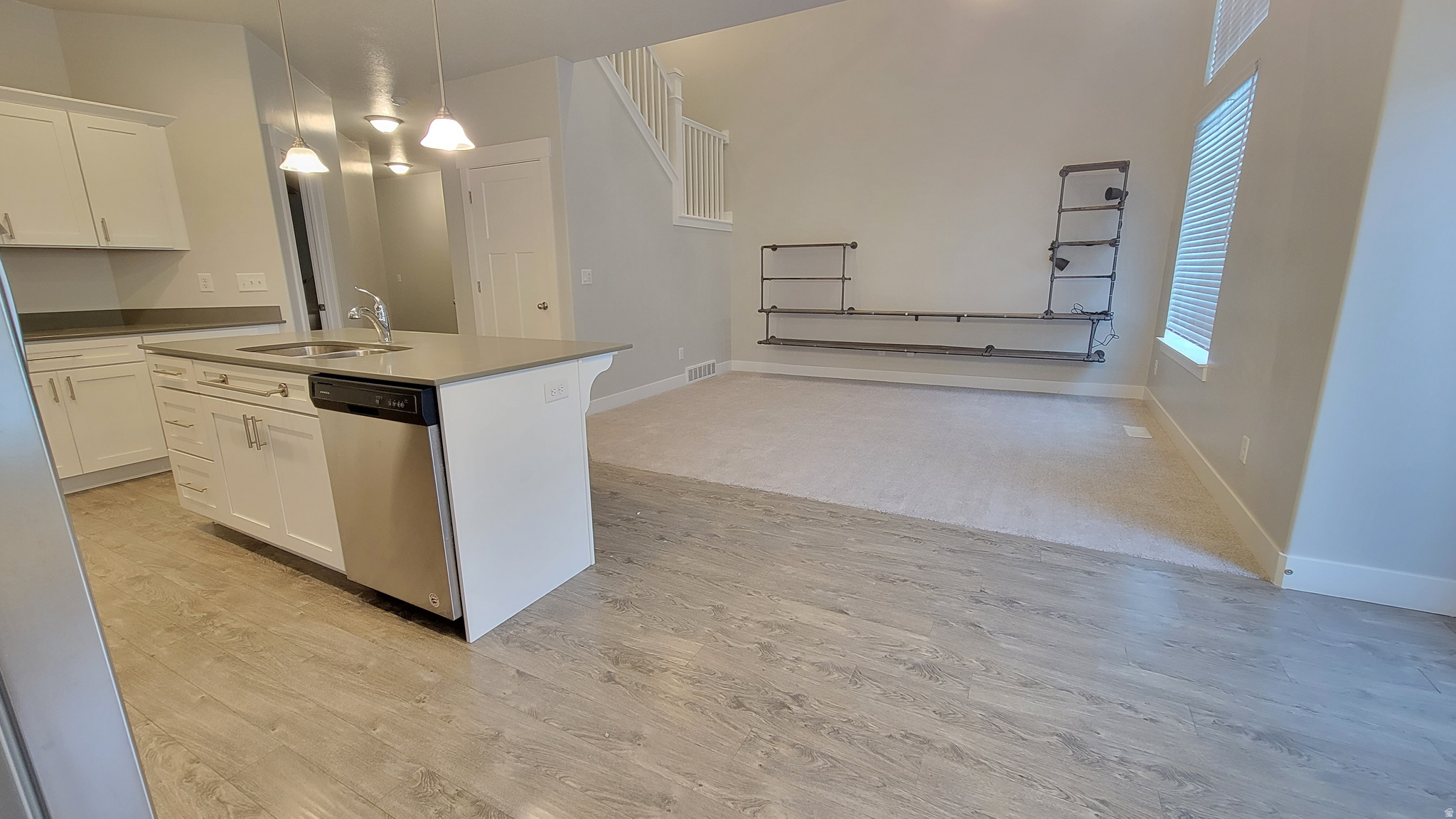 $5K SELLER CONCESSIONS & SELLER-PAID 1-0 buydown with preferred lender. This beautifully maintained mid-row townhome is perfectly positioned in the Herriman foothills with direct community access to hiking and mountain biking trails via the Sky Ridge Park. Walk in to an open, vaulted ceiling with large windows providing amazing light and open main living atmosphere, perfect for entertaining. Built-in garage storage offers ample extra storage space for those utilizing the unfinished basement for useable space. Backyard is fenced and backs up to single-family residential community. Sky Ridge is conveniently located off of Juniper Crest and will soon benefit from new eastern crossover to Mountain View Corridor amenities, Lee's Market, restaurants, and more.  Square footage figures are provided as a courtesy estimate only and were obtained from Tax Assessors Office, buyer to verify all info and measurements. Listing agent is the owner of the subject property and is a licensed Utah real estate agent.