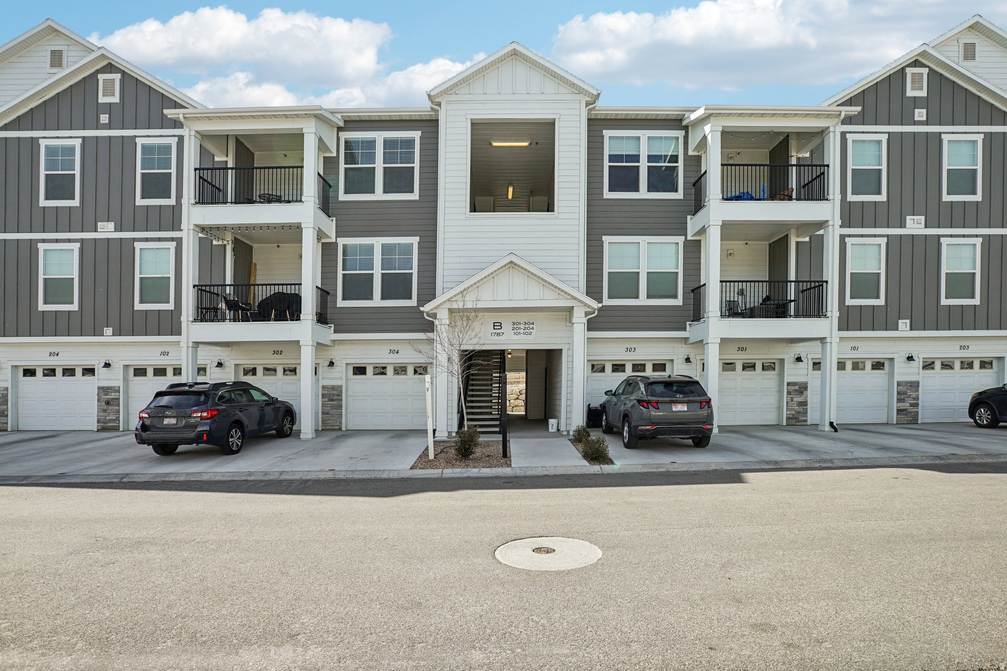 !!! PRICE REDUCED !!! Top-floor showstopper in Wildflower Village 2 with vaulted ceilings and no upstairs neighbors, offering privacy and an open, airy feel that's hard to find. This clean, well-maintained condo features quartz countertops, stainless steel appliances, and stylish designer pendant lighting that elevates the space. Step out onto the covered deck and take in incredible views-perfect for relaxing or entertaining. The spacious primary suite includes a private ensuite bath and a walk-in closet.  Enjoy access to Wildflower Lake and its reservoir, plus community amenities including volleyball, bocce ball, pickleball courts, picnic areas, playgrounds, and scenic biking and walking trails. The Wildflower dog park and dog wash are nearly complete, adding even more to this vibrant, growing community. Residents also have access to a clubhouse and swimming pool, making this an ideal blend of comfort, convenience, and lifestyle.