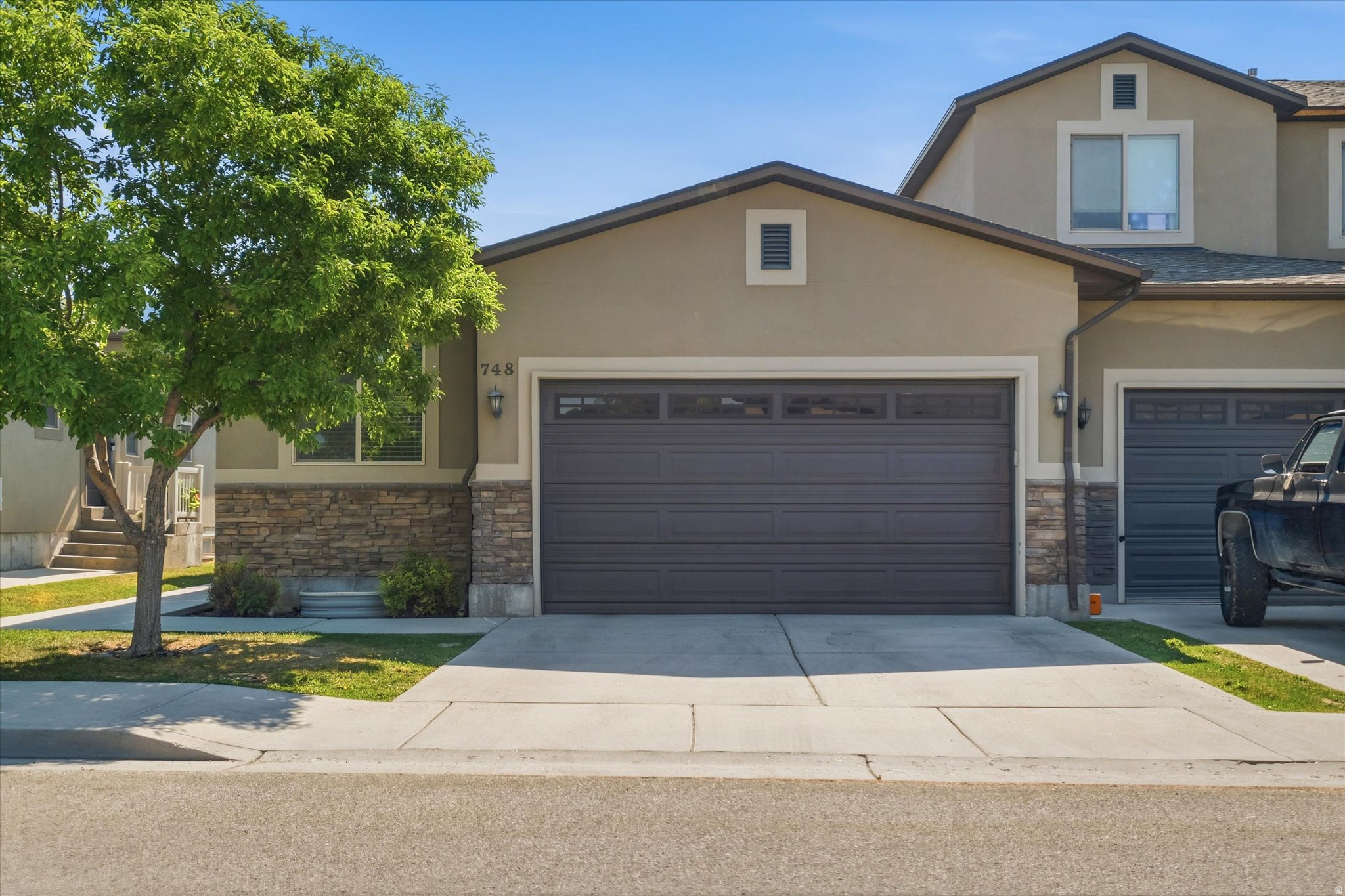 Spacious 5 bed 3 bath townhome with approximately 2,496 square feet located in the Stone Haven Community. Featuring a two car garage and driveway, backyard patio with greenspace, and mechanicals recently replaced, this home offers the perfect blend of low-maintenance living and single-family space, with an open-concept floor plan perfect for entertaining. The kitchen features a spacious pantry and granite countertops while the primary bathroom has a walk-in shower with dual shower heads and a linen closet. Enjoy peace of mind knowing that the water heater, HVAC system, AC unit, and carpet have all been replaced in the past year. HOA amenities include: pool with lazy river and slide, clubhouse with movie theater and fitness center, park with pavilion, playground and volleyball pit, lawncare, and all exterior maintenance.