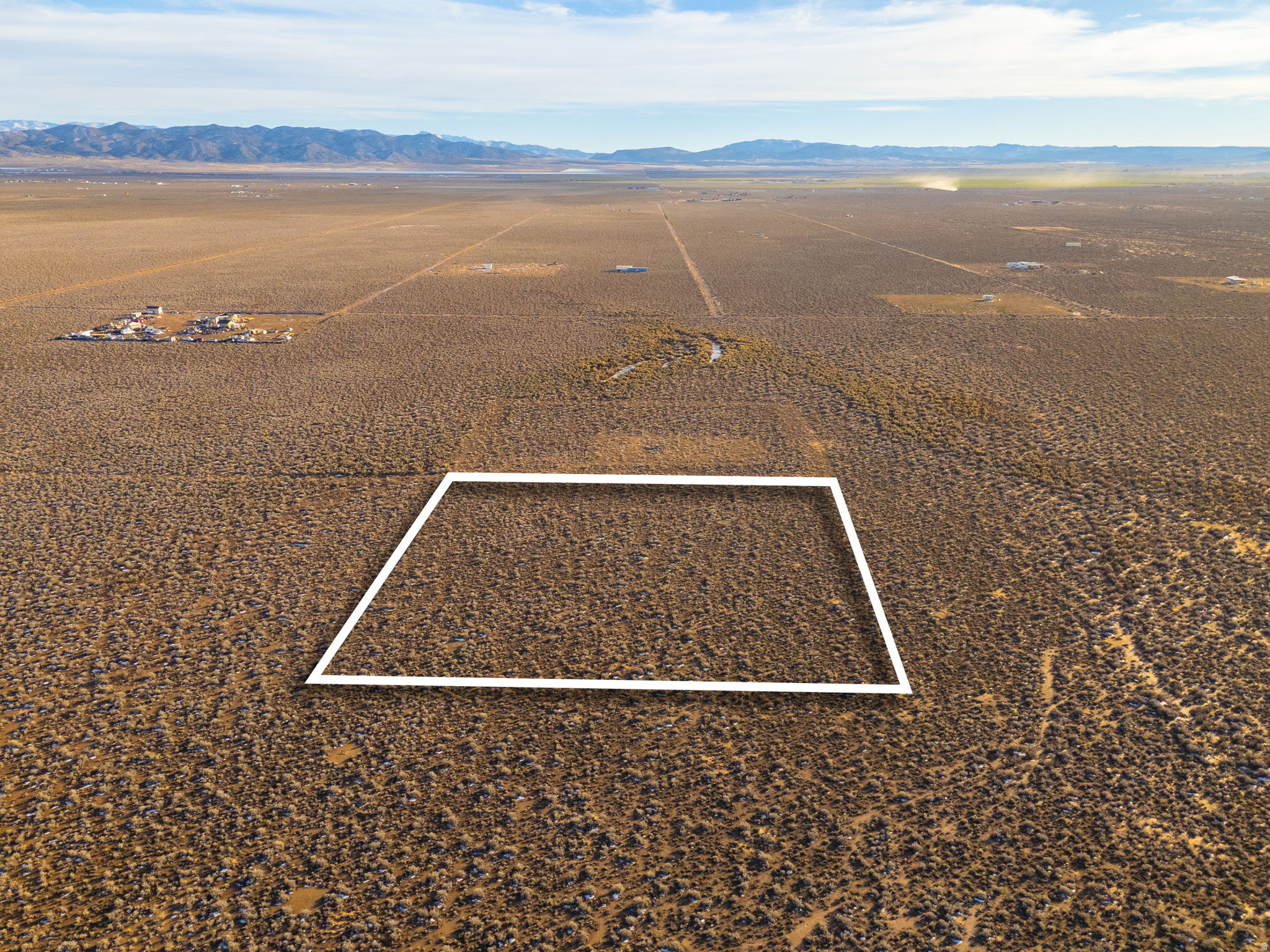 Wide-open skies and true freedom on 2.27 acres in Valley of Vision, Unit 5. This is Southern Utah at its most peaceful -- panoramic mountain horizons in every direction, some of the darkest night skies in the state, and the kind of quiet only wide-open country delivers. With no HOA and no CCRs, it's a blank canvas: bring your own builder for an off-grid retreat, stake out a recreation basecamp, or simply hold a low-maintenance piece of the West (annual taxes are under $30).  Convenient to Cedar City, Enterprise, and miles of open recreation. GPS coordinates provided -- drive out, walk the corners, and feel the space for yourself.