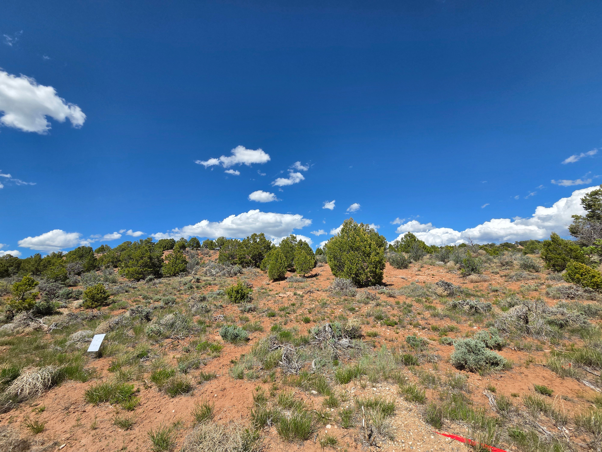 * Beautiful 10.567 Acre Lot at Oak Hills Ranch in Fruitland! * Gated Community * Year- round access * Underground Power transformer stubbed to each lot * Connected to water with a shared well & perk test done for septic! * This land is ready to build your dream home or you're welcome to camp! * 6 lots available!! * This lot is located across from a new fishing pond that is being added to the ranch & has many flat areas, trees and landscape * Beautiful views!! * Amazing place to escape and enjoy some peace & quiet * Red Creek Reservoir within minutes * Only 30 mins from world class fishing at Strawberry Reservoir, Starvation & Current Creek Reservoirs along with many streams/rivers! * Fishing, hunting, wildlife and all the recreation you can imagine right from your back door! * Wonderful place to have a vacation getaway or build your dream home! * Horse property! * Miles of dirt roads to ride 4wheelers, dirt bikes & side by sides!  Buyer will be required to pay $275 per year for road maintenance access through Bandanna Ranch/Thunder Ridge. * Once you build - Nightly rentals for AirBnB are allowed!