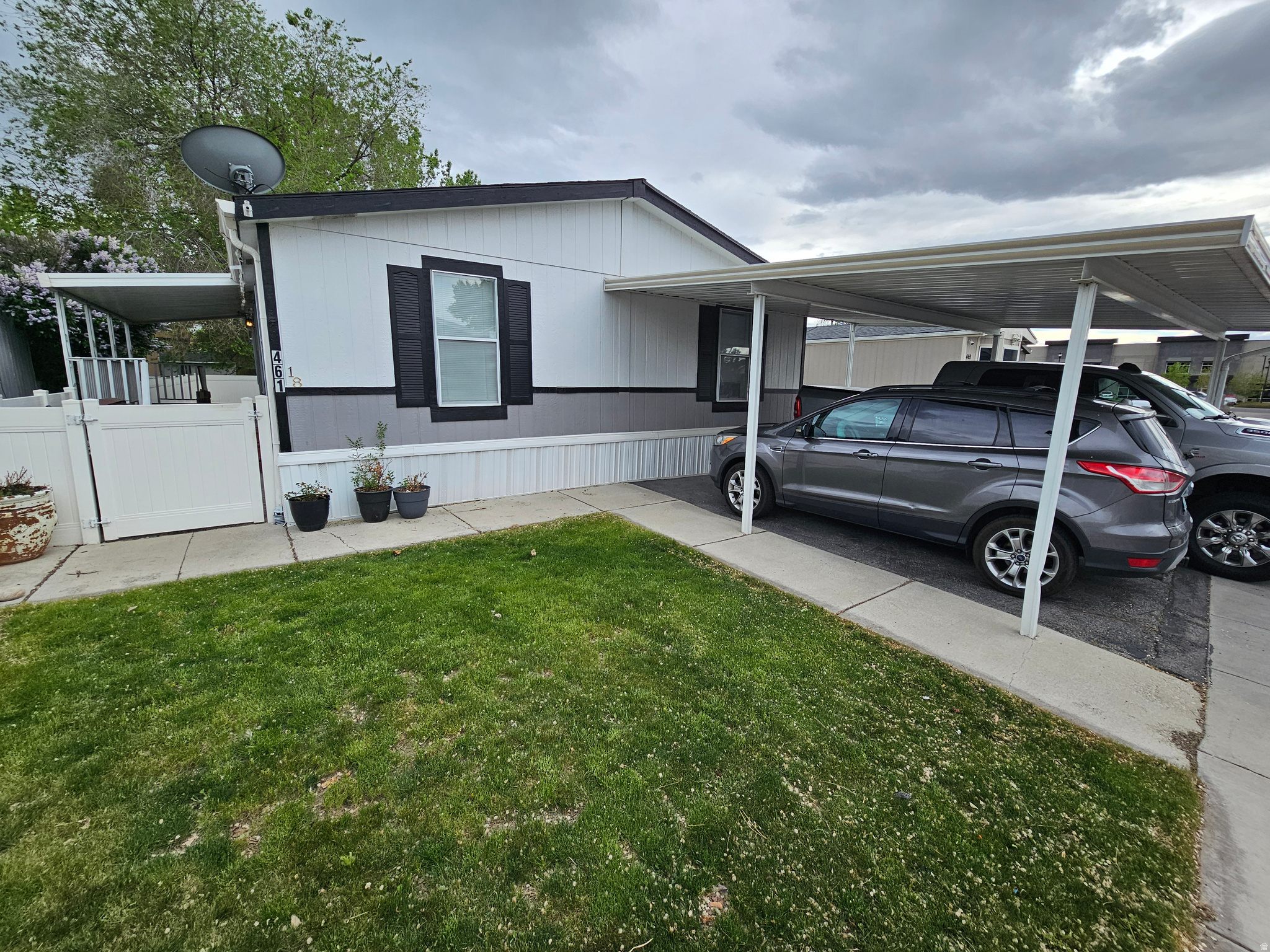 Nice open floor plan with vaulted ceilings, Newer central air, Large covered deck on side and in back, 2 car covered parking. Good location with quick access to I-15 freeway. Tuff shed in back. Square footage figures are provided as a courtesy estimate only.  Buyer is advised to verify all info.