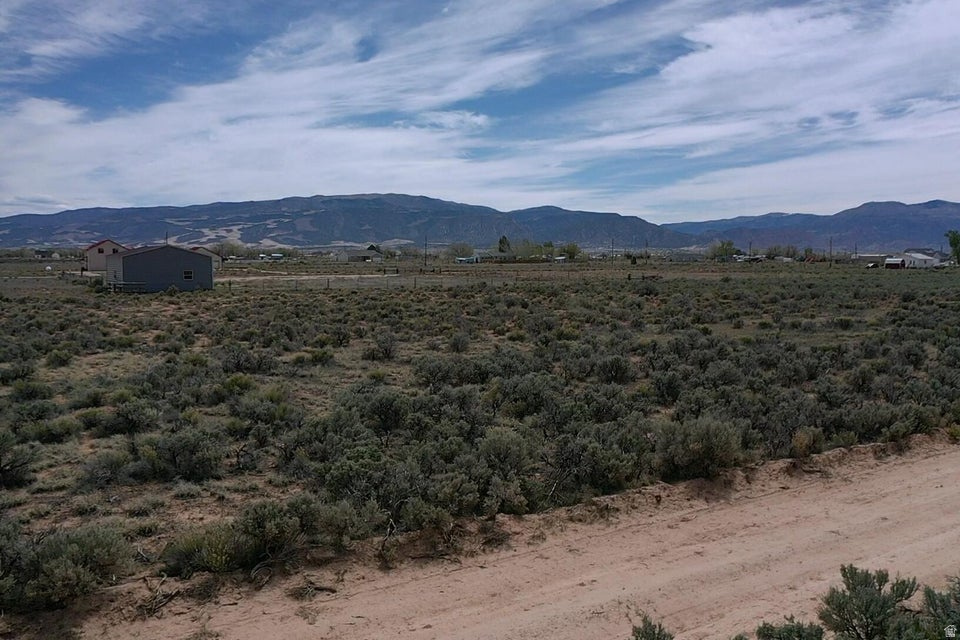 Ready to build your dream escape? This 1-acre slice of heaven in Cedar Valley Acres is calling your name! This lot is the ultimate ''choose your own adventure'' for home building. With power nearby and fantastic access, the hardest part will be deciding which way to face your front porch to catch those valley sunsets. It's level, spacious, and ready for your big ideas. Whether you're looking for a spot for a future hobby farm or a quiet retreat from the grind, this is the awesome opportunity you've been waiting for. Grab your boots and come take a look--land this good doesn't wait around!