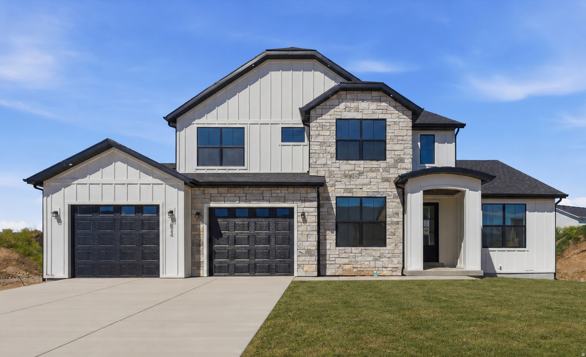 Welcome to the Blossom plan, a brand-new, move-in-ready home offering 6 spacious bedrooms, including a main-floor primary suite, and a fully equipped Accessory Dwelling Unit (ADU). Whether you're accommodating extended family or looking for rental income potential, this home is designed to adapt to all stages of life. Located in a new community with no HOA, this home is just steps from Spanish Fork Main Street, the new FitCity Center, and the scenic river trail system, putting dining, fitness, and outdoor recreation right at your doorstep. Inside, the kitchen features a 36" gas range and a full butler's pantry that keeps prep work and storage neatly out of sight. Vaulted and tray ceilings add an open, airy feel throughout, while the primary suite offers a separate soaking tub and walk-in shower. The oversized ADU is built with 10' foundation walls and includes a full kitchen, 2 bedrooms, and a dedicated laundry room. An additional suspended slab basement provides flexible space perfect for a home theatre, gym, or storage. Front yard landscaping will be added prior to close. A homebuilder warranty is included. Buyer to verify all details.
