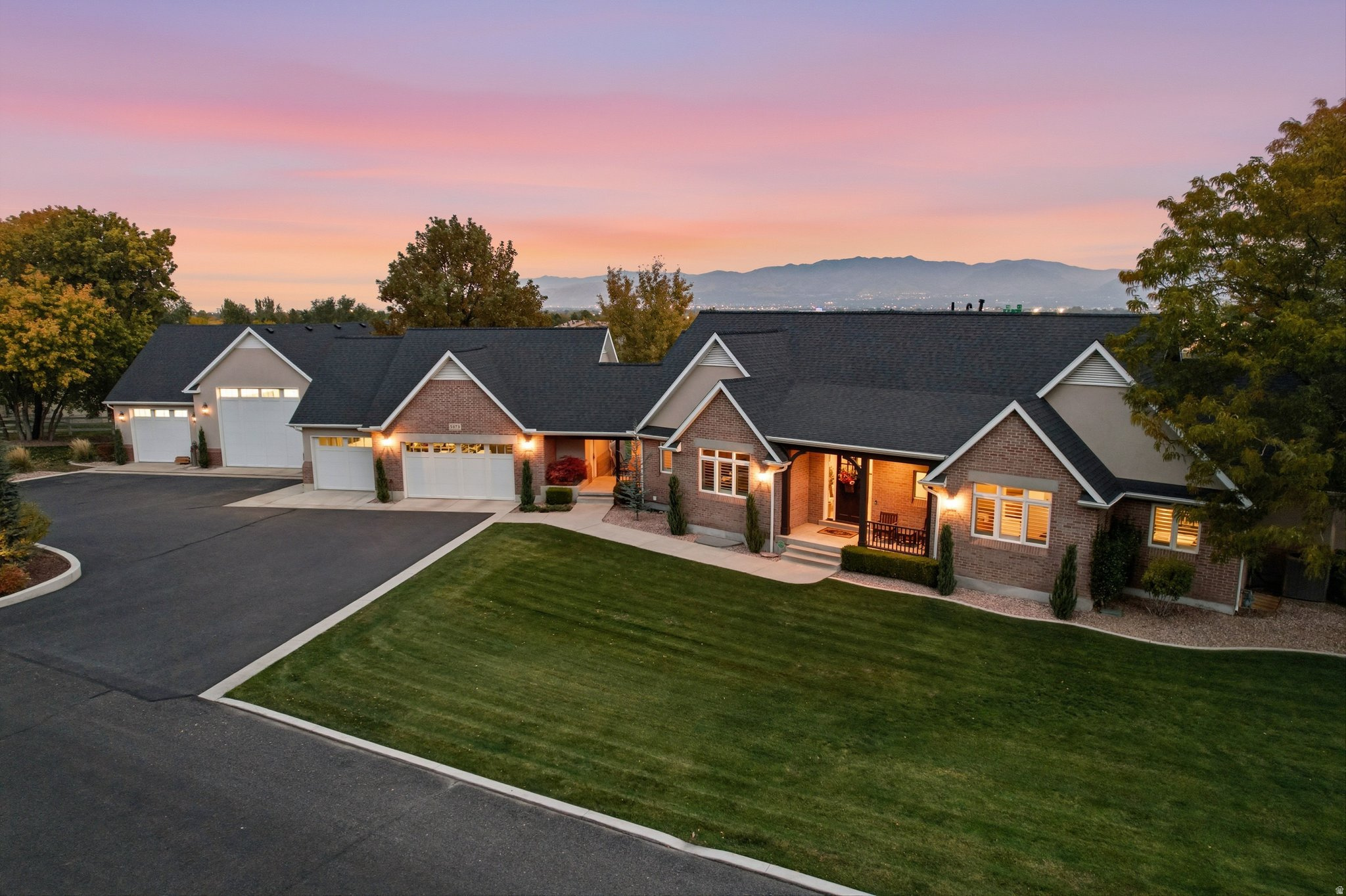 *New price!* Experience elevated living in this Taylorsville luxury home, where breathtaking mountain views meet high end design and top tier upgrades. This home offers the feel of brand new construction in an established, highly desirable location. Flooded with natural light from expansive windows with shutters throughout, the open layout creates a bright, inviting atmosphere designed for both everyday living and unforgettable entertaining. The chef's kitchen is a true centerpiece, complete with premium Wolf appliances, modern finishes, and a layout built to impress. Whether hosting indoors or out, this home was designed to bring people together.  Step outside to oversized balconies that capture stunning mountain views and provide the perfect setting for evening relaxation. Leaf filter raingutters and permanent exterior lighting add year round curb appeal and a polished, custom look.  The massive garage and dedicated man cave space set this property apart. Offering room for all your toys, tools, and hobbies without compromise.  With a brand new roof and extensive upgrades throughout, this home is truly move in ready with nothing left to do.   Opportunities like this don't come around often. Loaded with upgrades and unmatched views. This is one you don't want to miss.  Information provided as a courtesy only. Buyer to verify all information.
