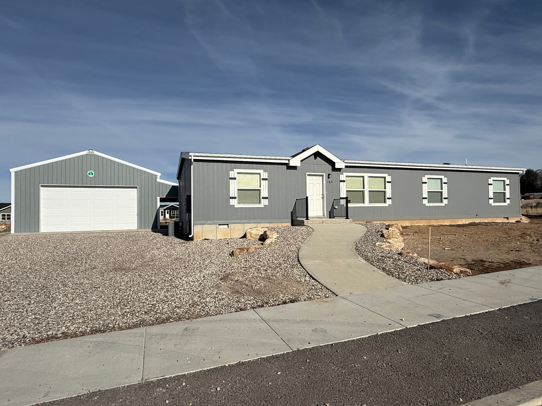 Located in a convenient subdivision just minutes from both the elementary and high school, this home offers an open floor plan perfect for everyday living and entertaining. Enjoy the flexibility of a detached garage with plenty of room for vehicles, recreational toys, or hobby projects. A great blend of comfort, functionality, and location. Furnishings can be included if desired. Buyer and buyer's agent/broker to verify all information.