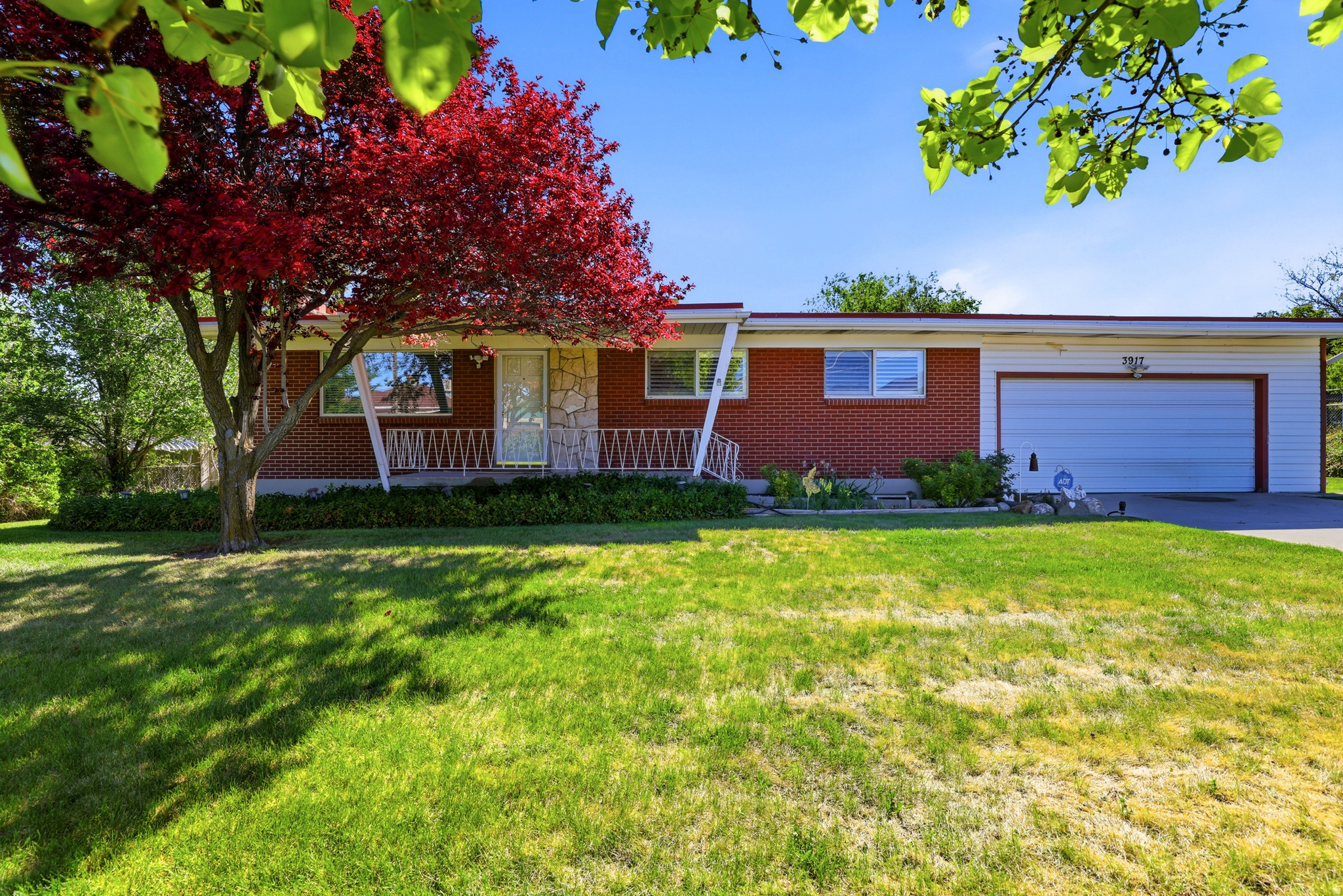 Fabulous brick rambler with large private yard! Fully fenced with mature landscaping offers privacy and security.  Very clean and well kept home gives you 6 bedrooms, 3 baths, ample storage and walkout basement. Boiler baseboard heating, newer carpet, shutters and newer gas range. This is a great property with so much potential, come and see it now!