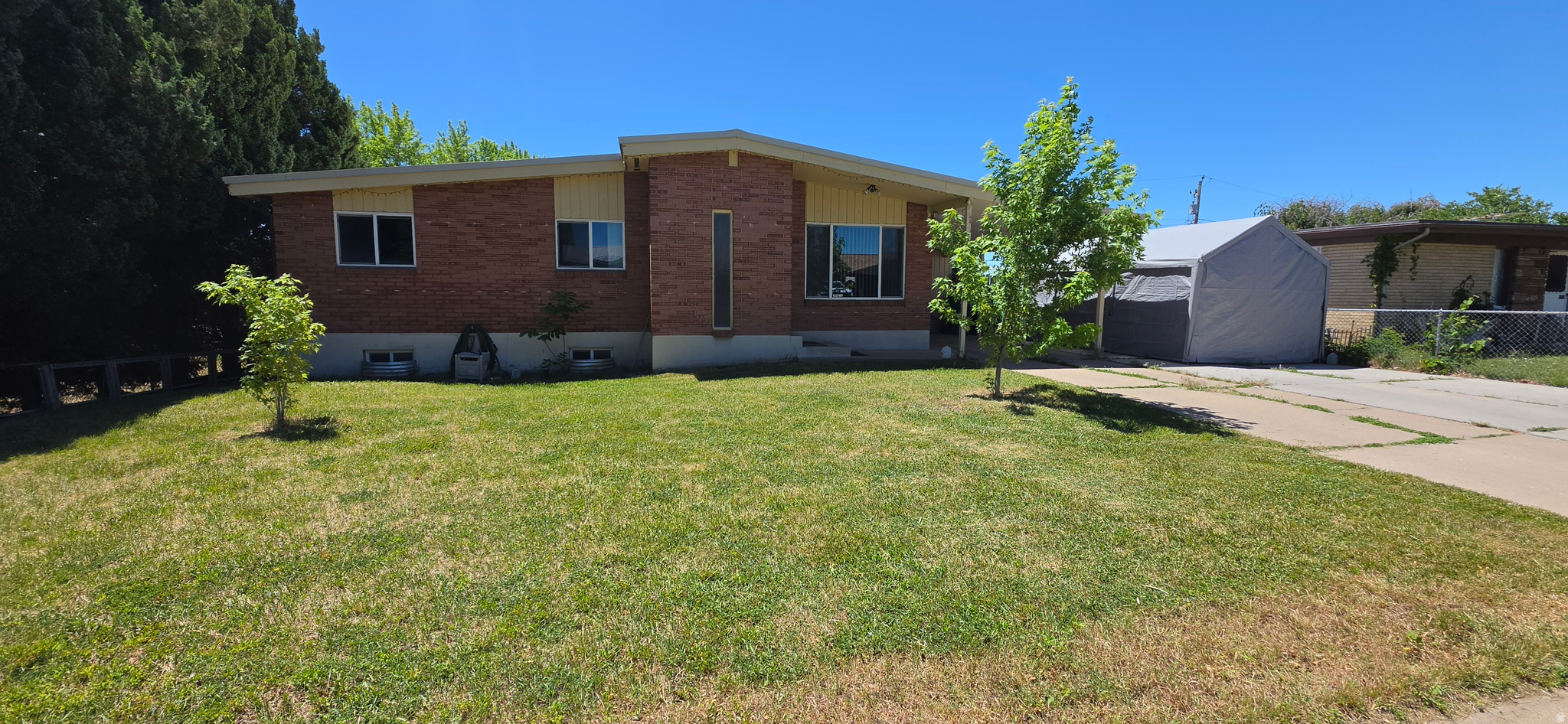 Beautiful Rambler style brick home with many upgrades. 5 bedroom 2 bath with brand new carpet throughout. New roof, whole home water filtration and newer water heater. Quiet neighborhood that is close to freeway, hospital and restaurants. Walkout basement for potential access and modification for ADU. Must see!!