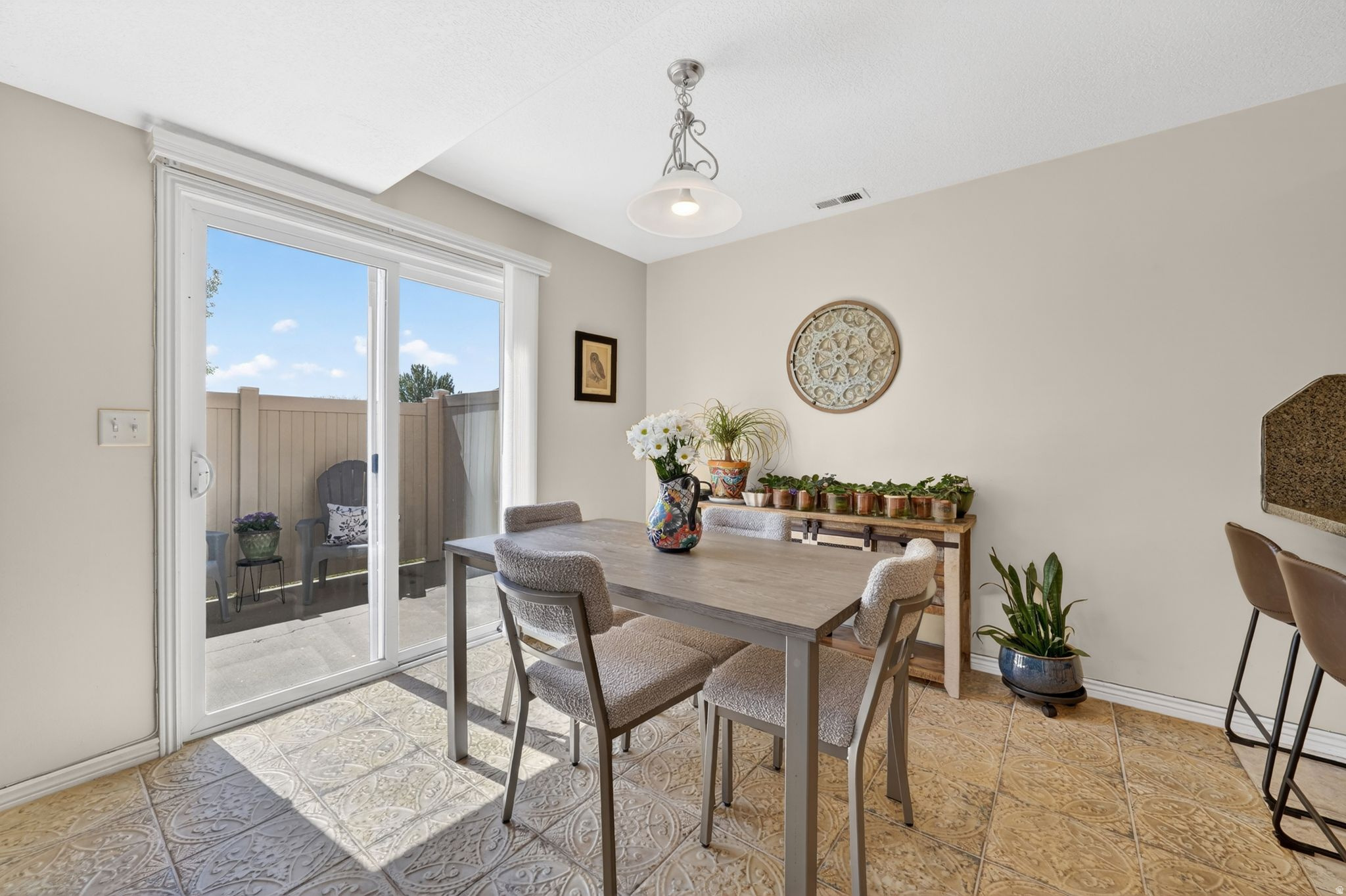 The kind of home buyers love! Clean, move-in ready townhouse with low-maintenance living and just the right amount of space. Fresh paint, an updated walk-in shower and granite counter tops give the home a modern, refreshed feel. Includes a private fenced patio with small yard and attached garage for added convenience. Buyer to verify all information.
