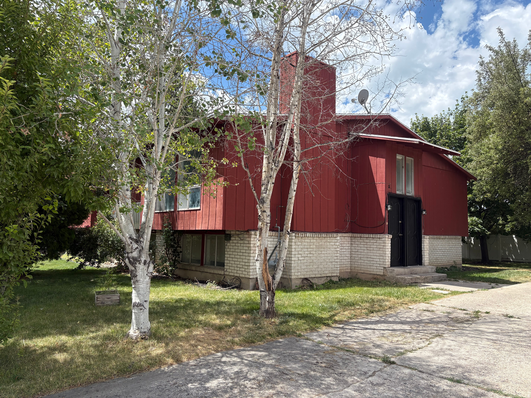Spacious 5-bed, 2-bath split-level twin home in central Provo! New carpet, tile floors, flexible lower-level living/5th bedroom, plus a long driveway with RV parking. Great investment or owner-occupied opportunity just minutes from I-15, BYU & UVU.  Whether you're searching for your next home or your next investment, this property offers outstanding value in an unbeatable central Provo location. For the past 14 years, this 5-bedroom, 2-bath twin home has been a successful rental with a strong income history, making it an excellent opportunity for investors. It's also a great option for buyers looking for a spacious home they can move into today while adding their own personal touches over time.  The functional split-level floor plan provides plenty of room to spread out. Upstairs features a bright living room, dining area, and kitchen, while downstairs offers a spacious fifth bedroom that's large enough to serve as a second family room, home theater, game room, or flex space to fit your needs.  The kitchen, dining area, and bathrooms feature durable tile flooring, with brand-new carpet throughout the bedrooms and rest of the home.  Outside, the extra-long driveway provides ample parking for multiple vehicles, trailers, or an RV-a rare convenience that's hard to find.  Location is another major highlight. Just 3 minutes from I-15, 2 minutes from shopping and restaurants at Provo Towne Centre, 5 minutes from Epic Sports Park, 8 minutes from BYU, and 10 minutes from UVU, putting recreation, schools, commuting, and shopping all within easy reach.  If you've been waiting for an affordable home with space, flexibility, and excellent potential-or a proven investment property with a long rental history-this is one you won't want to miss.  Square footage figures are courtesy estimates obtained from county records. Buyer is advised to obtain independent measurement.