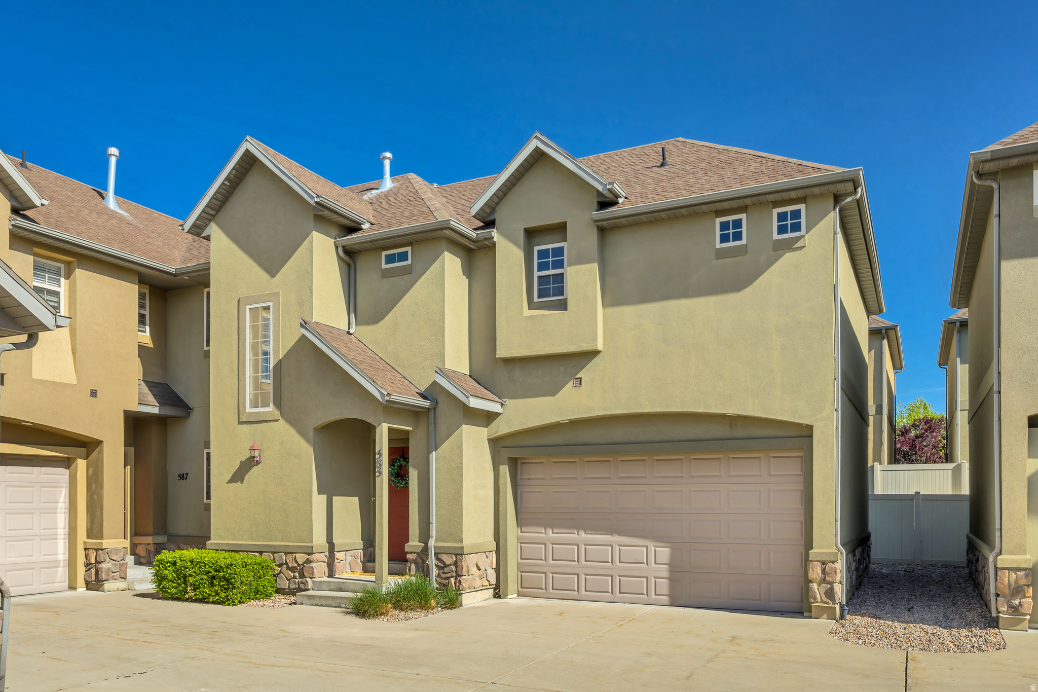 ** $10,500 price improvement 6/10**  Fabulous, clean and in a gated community! Enjoy a maintained and safe neighborhood where the HOA handles all of your lawn and exterior maintenance. Evening strolls without through traffic. Inside to marvelously maintained and move in now feel. You'll love the high ceilings and main floor layout with access to your private fenced back yard and patio where kids or pets can play freely. Timeless knotty alder cabinetry with dark granite countertops and stainless appliances.  Upstairs to a luxury master bedroom with mile-long walk-in closet and large soaking tub with a separate shower. Cushiest quality carpet you can find! Loft for bedtime stories or a bright and quiet office. Downstairs recreation room with theater setup complete with surround sound. A wet bar or second kitchen; your choice! Easily use as a turnkey studio basement apartment. Stay acclimated with 2023 95% efficient heating and air. Near trax!  Community pavilion and park.  Washer, Dryer and refrigerator included! You'll be so glad you came. Make it home today!