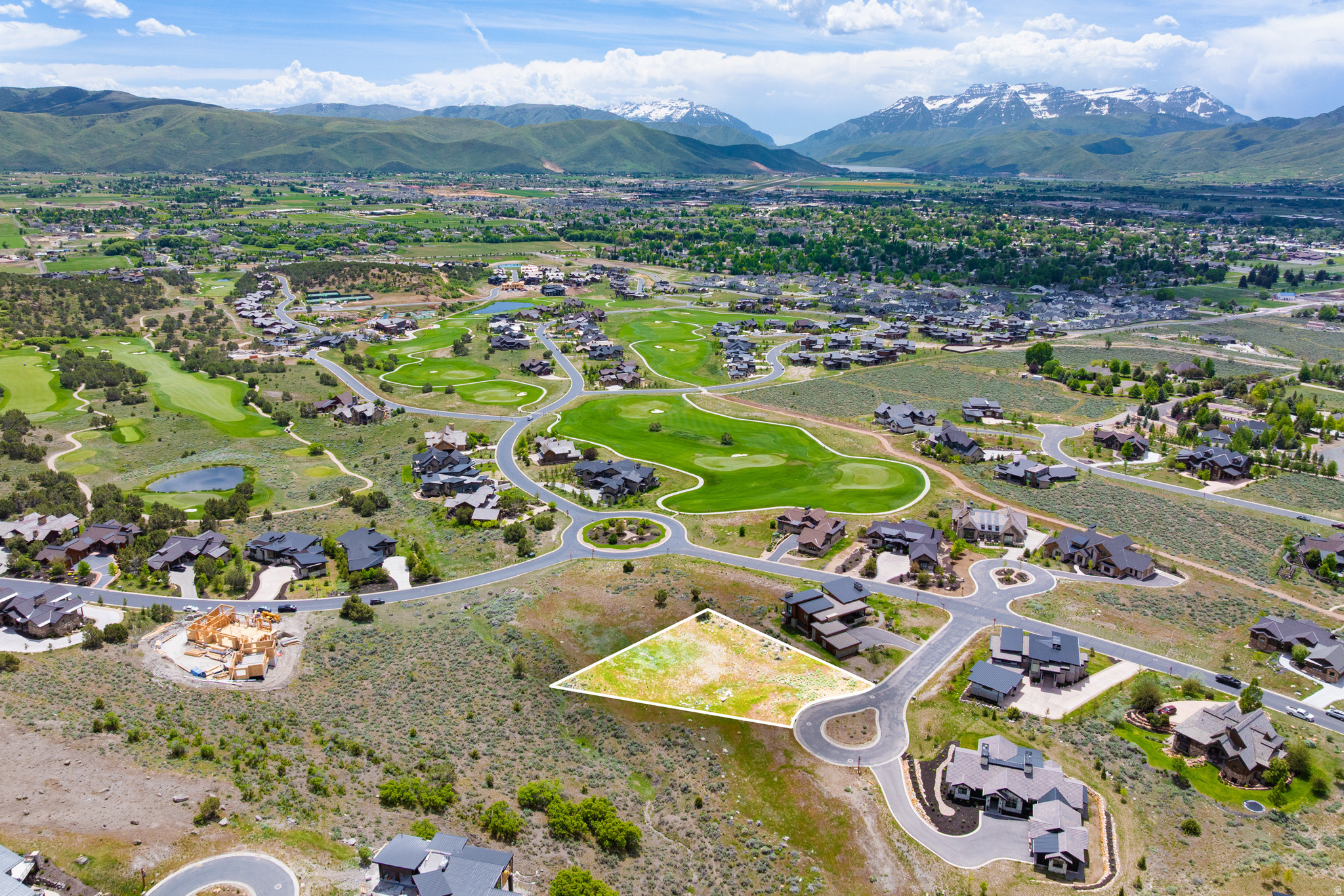 Situated on a quiet cul-de-sac, this exceptional 0.53-acre custom homesite offers a rare combination of southern exposure, privacy, open space, panoramic views, and direct access to the world-class amenities at Red Ledges. The property features a gently sloping, slightly downhill building envelope - perfect for a walkout design - and showcases stunning vistas of Mt. Timpanogos and the Heber Valley to the south. Ideally located within the community, this homesite offers convenient access to the Heber, the ever expanding Deer Valley East Village (15 minutes) and nearby Park City, just 20 minutes away. The lot also includes the availability of a Lifestyle Membership, granting access to the community's amenities. Red Ledges is renowned for its premier recreational offerings, including the award winning Cliff Drysdale Tennis Academy featuring ten tennis courts and six pickle ball courts, equestrian center, Wellness Center with its full suite of offerings, multiple pools and restaurants, private trails and more. Members also enjoy an exclusive partnership with the Deer Crest Club at the St. Regis Deer Valley, the Stag Lodge and Mariposa restaurant at mid mountain both available for private on mountain dining, all available via Club shuttles.