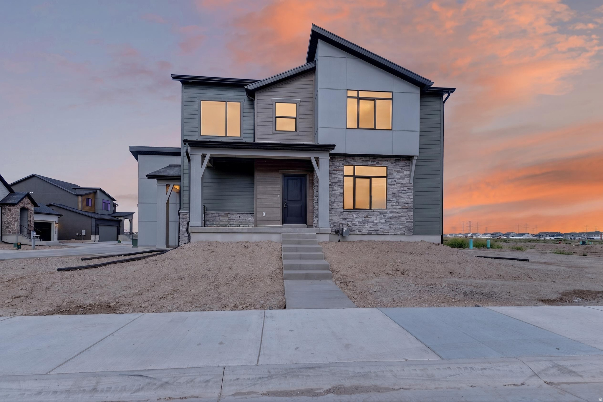 Welcome to The Brighton in Plain City's growing JDC Ranch community! This beautifully designed south-facing home is complete and move-in ready, offering abundant natural light and stylish, curated finishes throughout. The finished basement adds valuable extra living space perfect for entertaining, guests, or a home office. Enjoy great curb appeal with front landscaping included, plus future community amenities like parks, playgrounds, and walking trails just steps away. Don't miss your chance to own this brand-new home with modern comfort and space in an exciting new neighborhood.