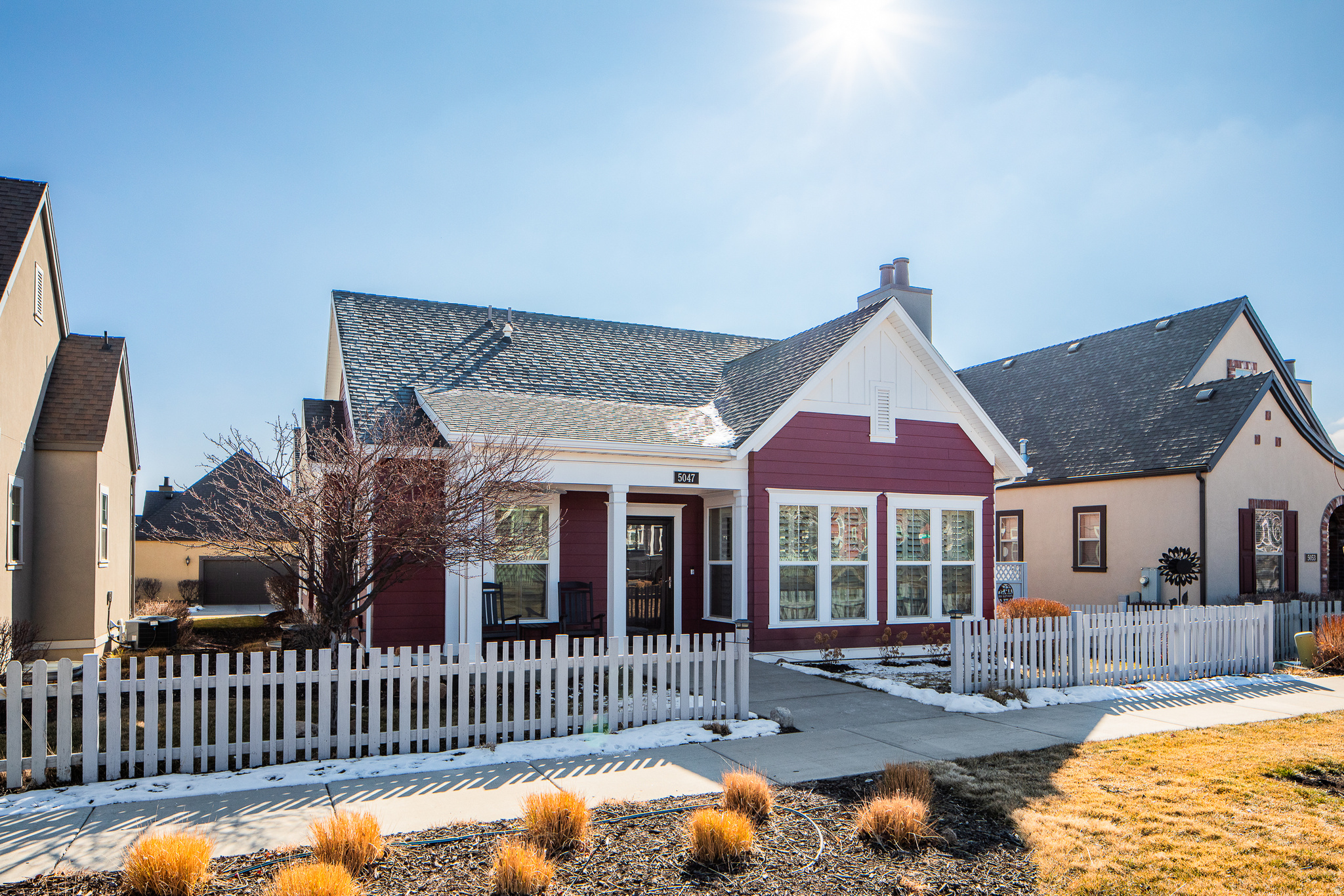 Welcome home to this amazing low-maintenance cottage style property located in the 55 and older, sought after Daybreak community of Garden Park! This custom home has been maintained impeccably and updated over it's short life. Most the flooring was upgraded to laminate, vinyl and the tile was removed and updated throughout much of the home. The exterior of the home was repaired (siding) and re-painted last spring (2025). The home features quartz counter tops, LED lighting, reclaimed wood accent walls, composite plantation shutters, radon mitigation system, large basement storage and cold storage rooms, smart wifi thermostat, keyless entry front door, wifi sprinkler timer, a private patio for relaxing and entertaining, and much more. This premium location has a large community yard/easement in the front of the home and is in close proximity to the lake, walking/running trails, Soda-Row restaurants and Daybreak entertainment district.  Exclusively to members of The Garden Park Community, this HOA includes full yard maintenance, paid internet, it's own community center, park, pool/hot tub, gym and pickleball courts! Plus you have access to all other Daybreak amenities! Garden Park is a 55+ community, but the "80/20" rule applies. Currently, there IS VACANCY for the 20% that do not need to be 55+. Don't miss your chance! Come see this amazing property today! Buyer is responsible for the .5% reinvestment fee at closing and an additional $75 account set up fee. Buyer is advised to obtain an independent measurement and verify all information provided in this listing.