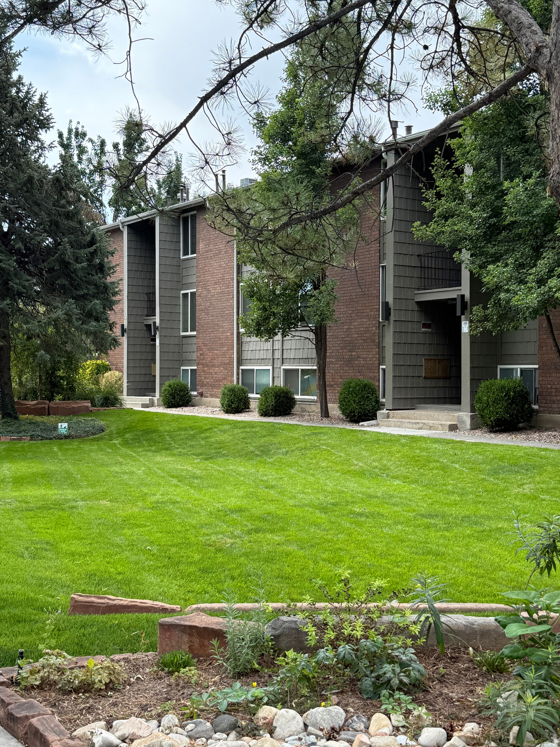 Beautiful top-floor condo located just minutes from the freeways, parks, Sugarhouse, and Downtown.  This well maintained home has seen many updates recently, including new HVAC, Water heater, new windows providing comfort and efficiency. Situated in a quiet gated community with secured and covered parking, the property offer both privacy and peace of mind. Residents enjoy beautifully maintained grounds lush landscaping, a BBQ and picnic area, and a community garden. Pet friendly community allowing one pet ip to 40 lbs (or service animal with no weight restriction).