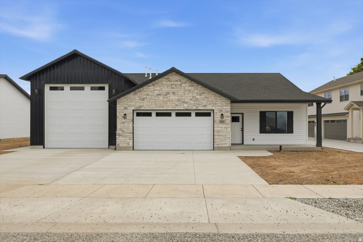Check out this newly constructed single level 3 bed 2 bath home, I guarantee you will fall in love with ever inch of this house! Beautiful cabinets, flooring, quartz countertops and backsplash is just a start! The 20 X 60 Rv shop is attached to the two car garage and they are heated to insure you don't have to winterize your second home while its tucked away from the sun and the elements! Enjoy the large covered patio on hot summer nights, rainy spring or fall evenings!