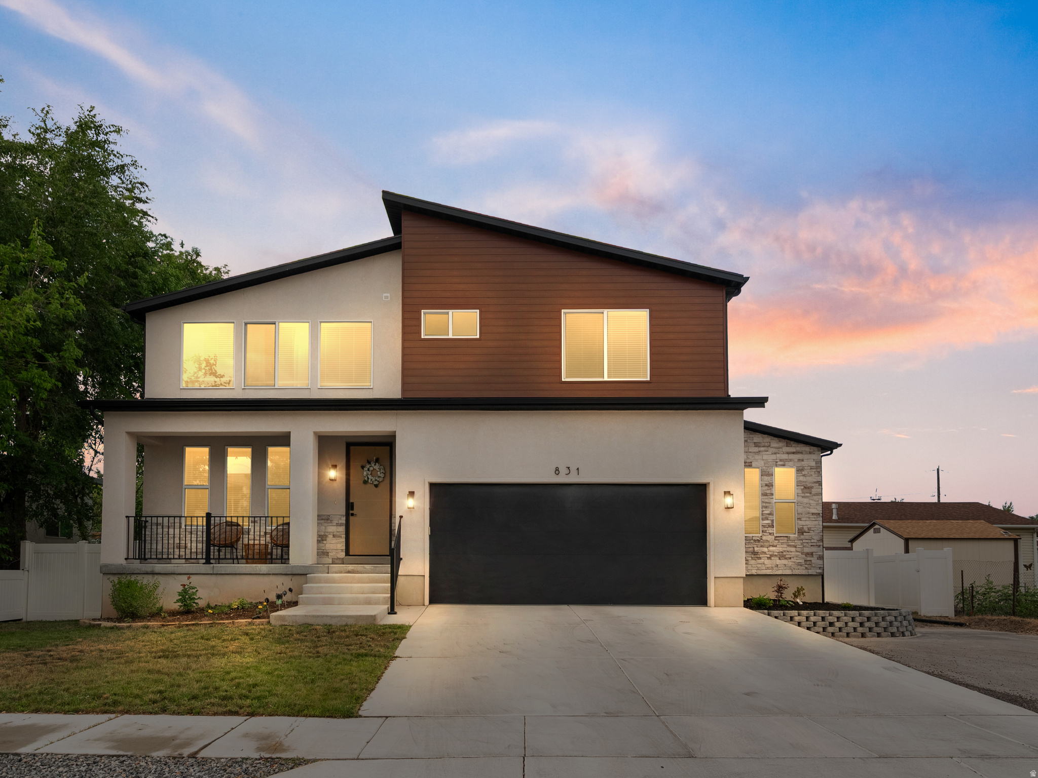 Welcome to this spectacular, fully custom two-story home built in 2023 and maintained in pristine, brand-new condition. Flooded with natural light, the open-concept main floor features soaring 9-foot ceilings and a dramatic, vaulted family room anchored by a cozy fireplace. The chef-inspired modern kitchen flows effortlessly into the living space, boasting high-end materials and premium, ultra-durable SPC (Stone Plastic Composite) flooring throughout. Designed for ultimate flexibility, the home features two complete primary suites with walk-in closets, one on the second floor and a second in the fully finished basement, which boasts 9-foot ceilings and luxurious heated bathroom floors. With a total of 5 bedrooms and 5 bathrooms, every inch of this home radiates quality. Electric vehicle charging is already wired in the garage. Nestled perfectly near the intersection of Millcreek, Holladay, and Murray for the ultimate central valley lifestyle. Don't wait-come tour it before it's gone!