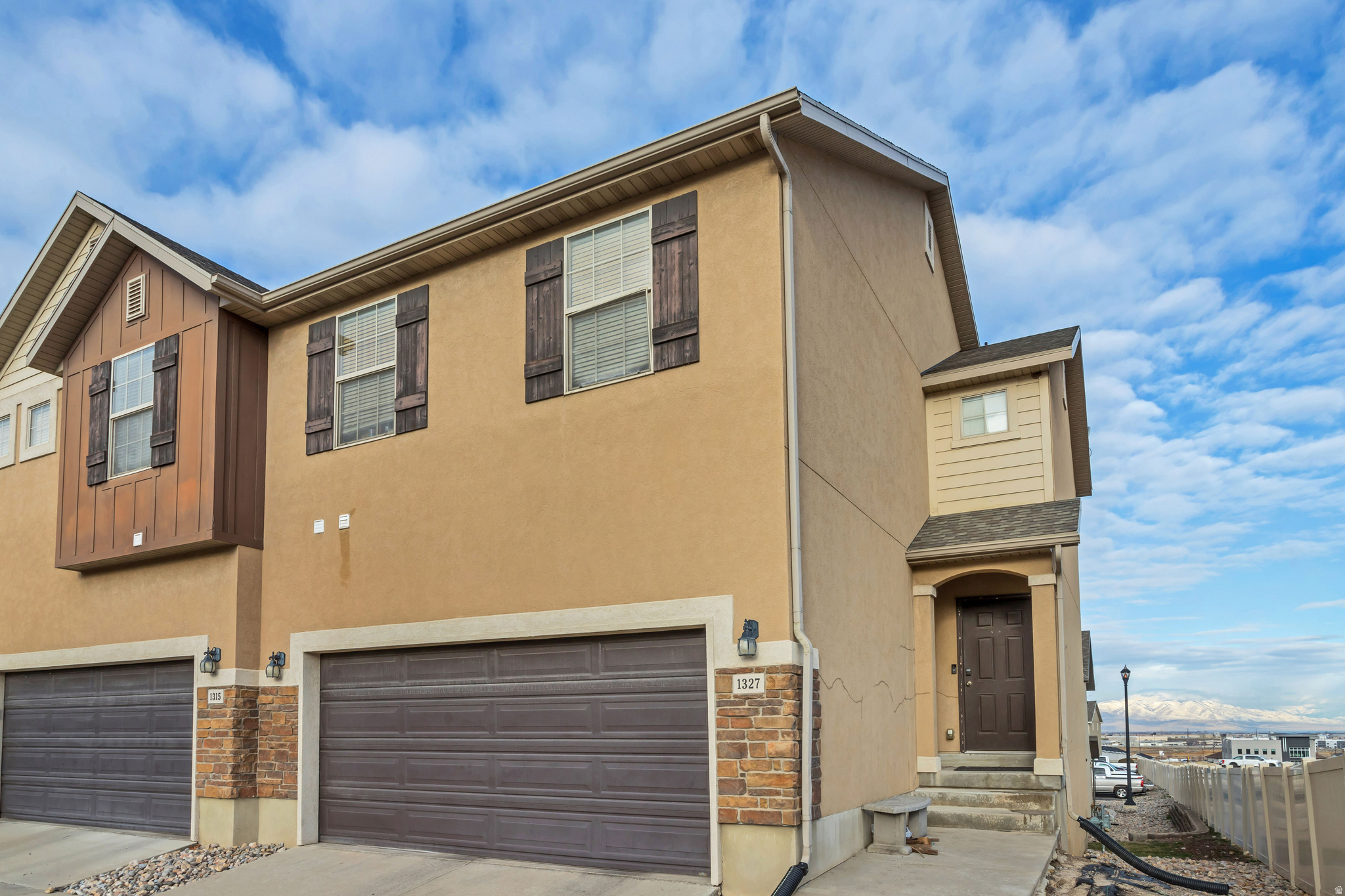 Welcome to 1327 N Lily Pad Dr! This end unit townhome has 5 bedrooms, 2  bathrooms, and a big master bedroom with ample closet space. Stainless steel appliances in the kitchen. Shopping areas within walking distance and conveniently located near the freeway and hospital, this residence also features 2 additional basement bedrooms for flexible use with a dedicated storage area. With its low HOA fee and perfect blend of mountain proximity and everyday convenience, it is an opportunity not to be missed. Schedule your showing today.