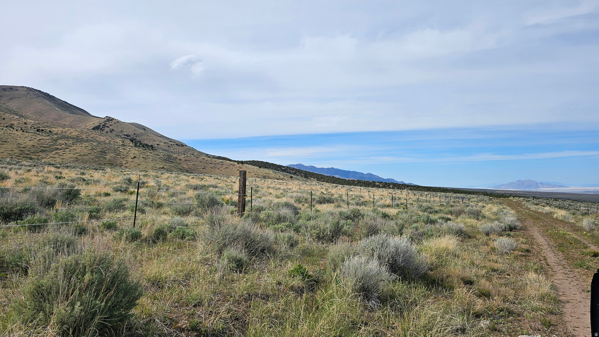 Big Price Drop! Welcome to Lot 25 of the Stansbury Agricultural Properties. Here you'll find a serene and private 20+ acre parcel of land with stunning views of the Stansbury Mountains and the Great Salt Lake. This large and nearly flat lot is on a quiet dirt road north of Hickman Canyon. Bring your horses, cows, and animals; the opportunities here are endless! This land was recently rezoned from MU-40 to A10, which provides new possibilities for land use. If you've been looking for a peaceful retreat away from the city's hustle and bustle, this property's quiet location will provide the perfect escape. Bring your family and RV and enjoy the quiet outdoors. Stansbury Agricultural Properties are near Hickman's Pass which provides endless opportunities for horseback riding, ATV trails and more.