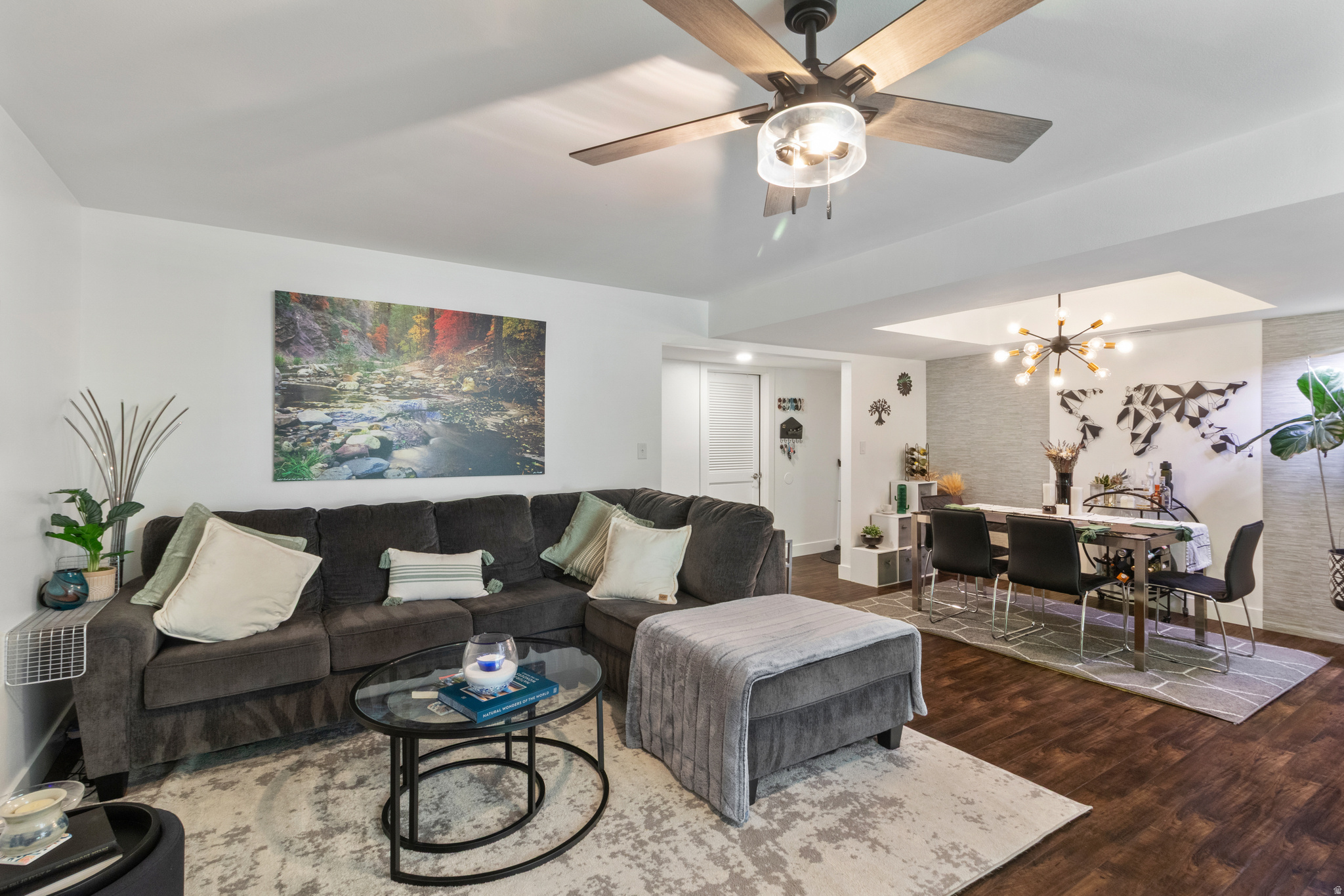 First time homebuyers dream! Seller would like to sell home fully furnished (price inclusive of this). Purchased and steadily renovated over the last four years with new flooring (carpet, LVT) 2022, paint 2022, washer/dryer 2022, hot water heater 2022, air conditioner / furnace 2025, kitchen flooring and all new appliances 2025, water softener 2025, and reverse osmosis at kitchen sink 2026. Located in the heart of Murray, near Murray Park, IMC/TOSH, and shopping center with grocery, gym, and restaurants. This 2 bedroom 2 bath condo is ready to move in as is! Primary bedroom has ensuite bath and walk-in closet. Second bedroom has walk-in cloet and is also connected to main bath via the walk in closet. Very open floor plan for hosting, but rooms feel very private. Owner rented out one room to healthcare providers during ownership to supplement mortgage payment. Patio provides a great view and windows add natural light into the home. Plenty of storage in the laundry/utility room and two closed/ secure closets in garage. Large trees surrounding property offer color, privacy, and shade. Enjoy this summer lounging by the community's inground and fenced pool. Schedule your showing today.