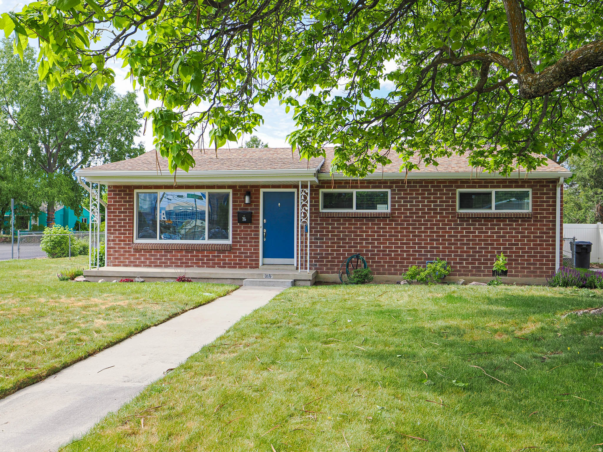 This charming rambler in Murray is conveniently located near TRAX, I-15, and I-215, offering easy access throughout the valley. The home features an updated bathroom, an updated kitchen with granite countertops, and a spacious dining area perfect for everyday living and entertaining. With two comfortable living rooms, there is plenty of space to relax and gather. This rambler offers 3 bedrooms, a beautiful yard, and a 2-car carport, making it a wonderful place to call home.