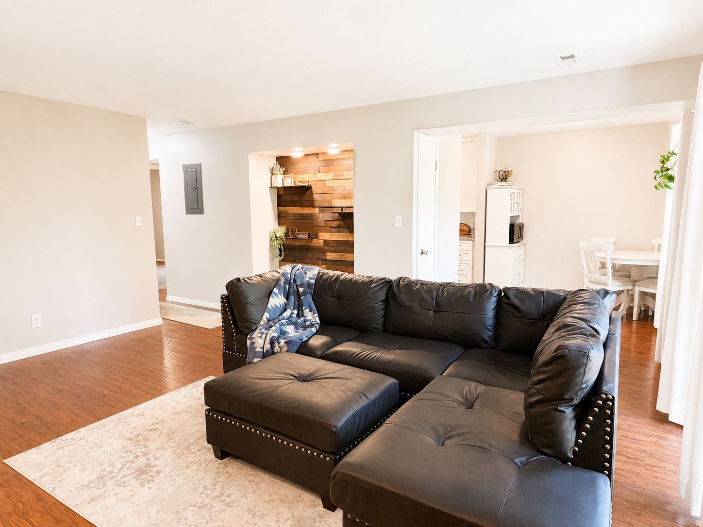 Nestled in the quiet, hidden community of The Willows, this charming third-floor 2-bedroom, 1-bath condo offers a sensational blend of comfort, convenience, and the joys of nature. As you drive into the neighborhood, you are instantly met by a lush canopy of mature trees, tranquil ponds, and the soothing sound of running water fountains.  Inside the condo, you'll find a beautifully updated interior with abundant natural lighting and a warm, welcoming vibe. Complete with a cozy centerpiece fireplace and an updated kitchen featuring newer appliances, including a gas stove and refrigerator.  Step out onto your private balcony to enjoy peaceful views of the mature trees, community ponds - complete with resident ducks and geese - and the soothing sounds of Little Cottonwood Creek flowing nearby.  Both bedrooms are generously sized with large newer windows and walk-in closets, offering comfort and ample storage. The updated bathroom features a modern vanity with a contemporary vessel sink, along with a shower/tub combination for added functionality with neutral finishes to create a fresh, spa-like feel.  Residents of The Willows enjoy community amenities, including a swimming pool, clubhouse, beautifully maintained grounds, and convenient on-site laundry facilities. This unit also includes a parking space near the building entrance, a designated garage space with additional storage, and ample guest parking.  Ideally located within walking distance of Murray Park and Friendship Park. The condo is just minutes from Fashion Place Mall, shopping, dining, and quick access to I-15 and I-215, this home offers the perfect balance of tranquility and accessibility.  Whether you're searching for a peaceful place to call home or a strong investment opportunity, this charming condo offers an exceptional lifestyle in one of Murray's most hidden and picturesque communities.