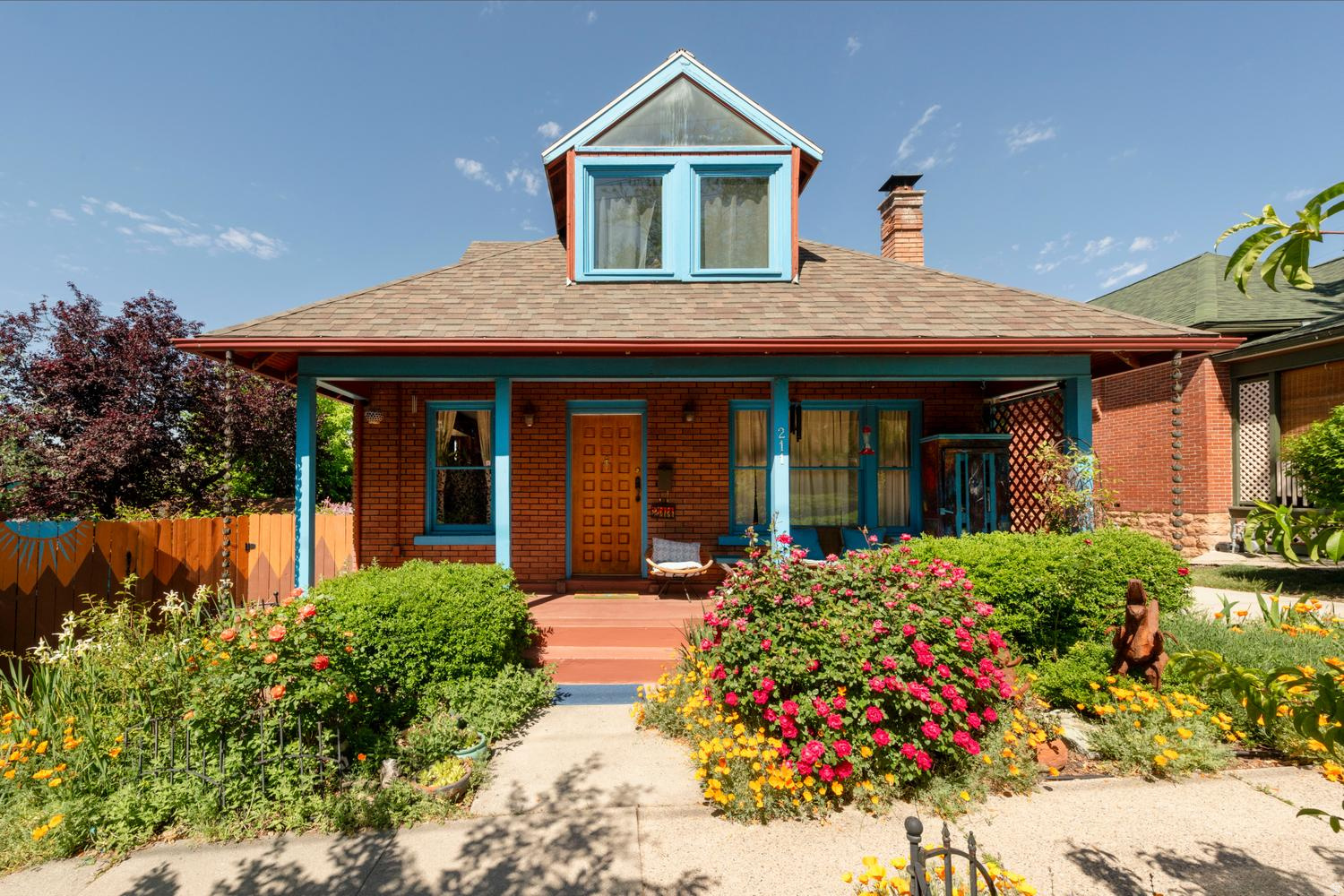 Seeking a unique, artsy home in the Lower Avenues? This is it! Full of historic charm and character, this home sits on a historic feeling street. Original fir floors add warmth and authenticity, while remodeled bathrooms and a spacious primary suite with a primary bath bring modern comfort. The main floor includes a dedicated office, perfect for working from home. Enjoy a secluded urban yard featuring stone and brick patios, a welcoming sitting porch, and a thoughtfully designed xeriscape landscape with mature peach and nectarine fruit trees. A mini-split system efficiently cools both the main and upper levels, completing this one-of-a-kind offering.