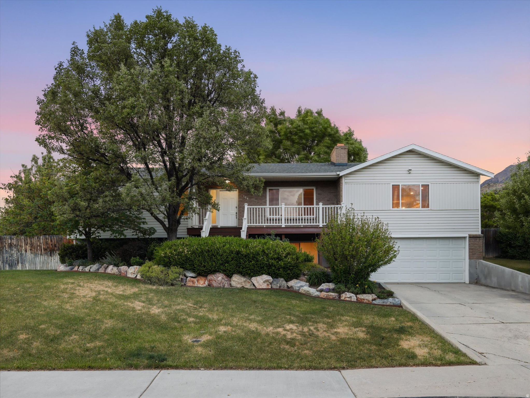 Tucked away on a quiet street with beautiful mountain views, this well-cared-for home offers comfort, functionality, and space to enjoy inside and out. Features include a remodeled kitchen (2017), new roof (2025), great storage and pull-out organization throughout, a functional laundry room, and dedicated food storage room. The backyard is perfect for relaxing or entertaining with a large deck, four raised garden beds, and a basketball standard. Cared for with pride over many years, this home offers a rare sense of consistency and attention to detail. Ideally situated within walking distance of schools.   Square footage figures are provided as a courtesy estimate only, Buyer is advised to obtain an independent measurement.