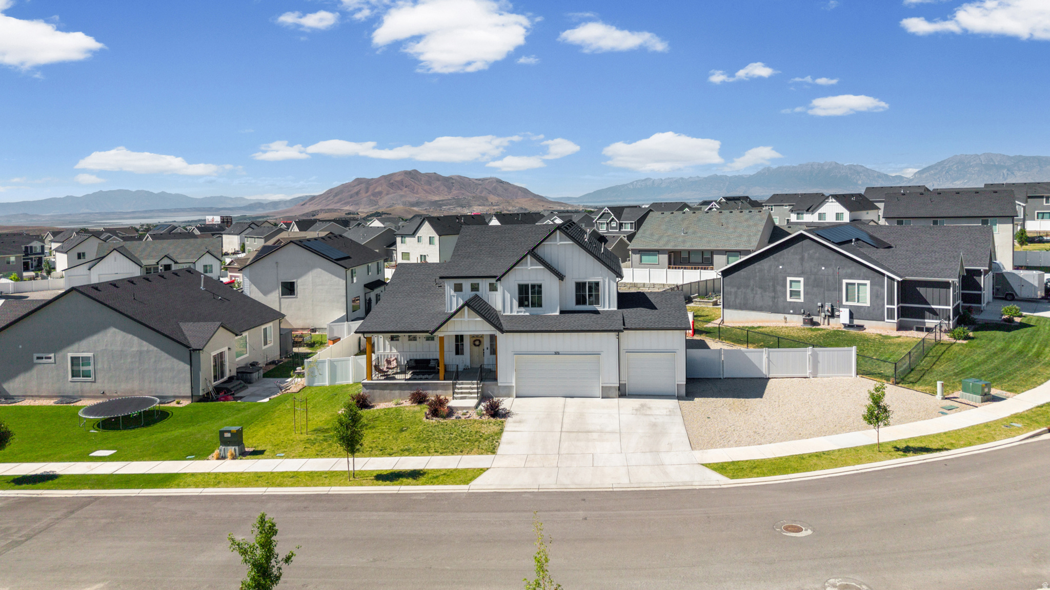 Take in beautiful mountain views from this thoughtfully designed 4-bedroom, 3-bathroom home. Featuring an open-concept layout and a main-level primary suite, this home offers the perfect balance of comfort, and style. Set in one of the area's most sought after neighborhoods. Foothill Village.   The spacious kitchen opens to the dining and living areas, creating a bright, welcoming space that's ideal for entertaining. Large windows bring in plenty of natural light while showcasing the surrounding scenery.   An unfinished basement provides a blank canvas for future growth, allowing you to add instant equity while designing the space to fit your needs. With ample RV parking and easy access to nearby ATV trails and a local fishing pond, adventure is always within reach!