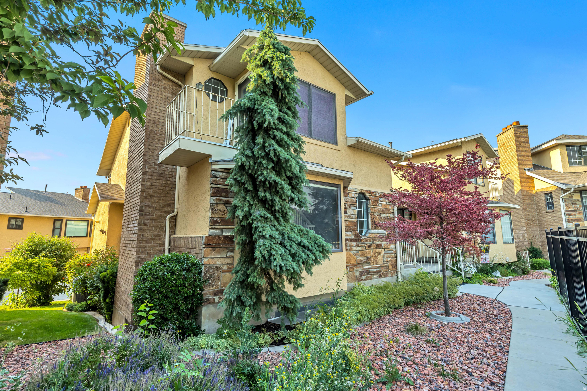 Don't miss this beautifully updated townhome in one of the best locations in the community! Just steps from the neighborhood pool, this home offers the perfect blend of comfort and convenience. The spacious kitchen opens to a bright and inviting living area, creating an ideal space for entertaining or everyday living. The impressive primary suite features a vaulted bedroom that adds an airy and luxurious feel, while the attached two car garage provides plenty of storage and convenience. With stylish updates, an unbeatable location, and exceptional community amenities just outside your door, this move in ready townhome is one you won't want to miss! VACANT AND EASY TO SHOW